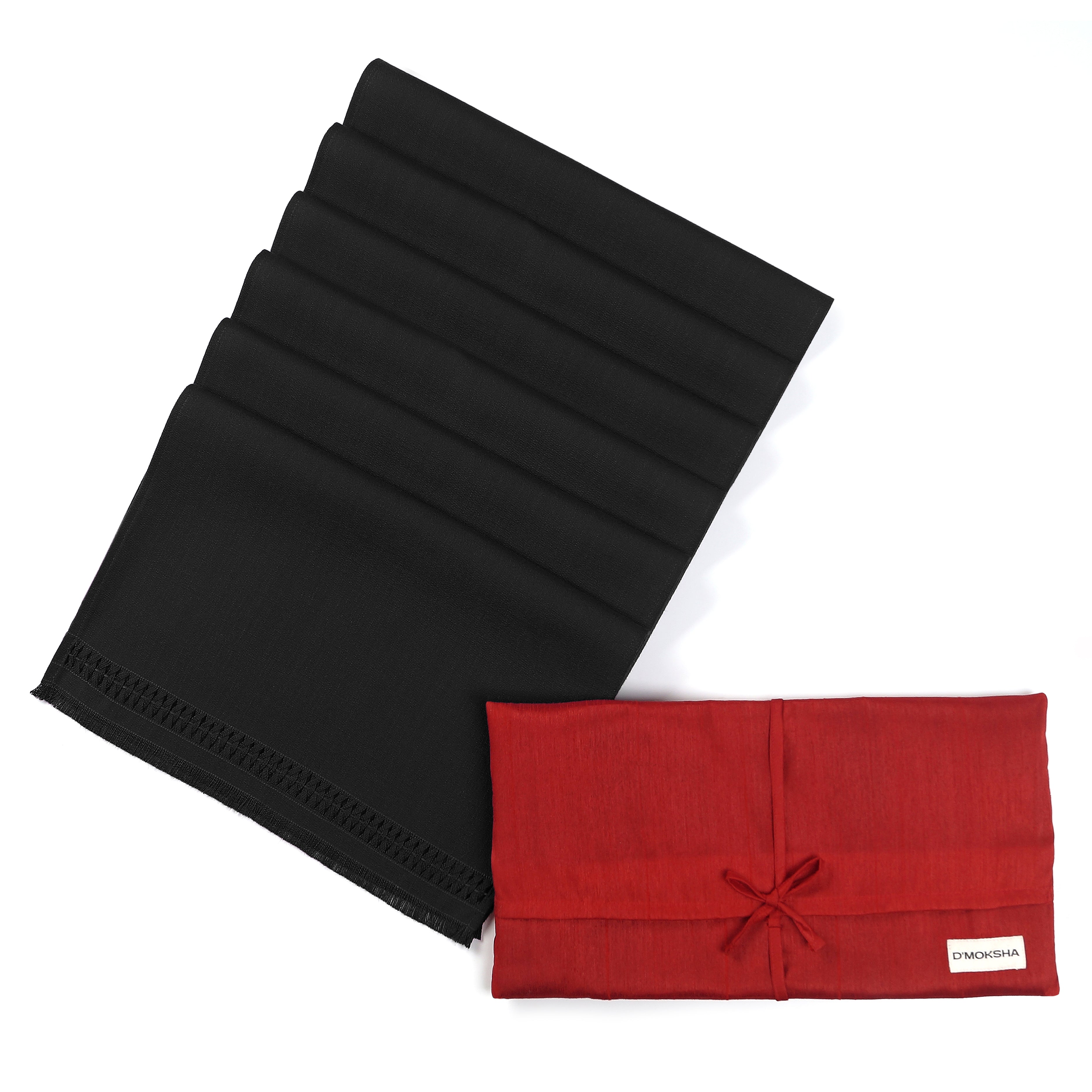Black faux linen placemats in a set table setting