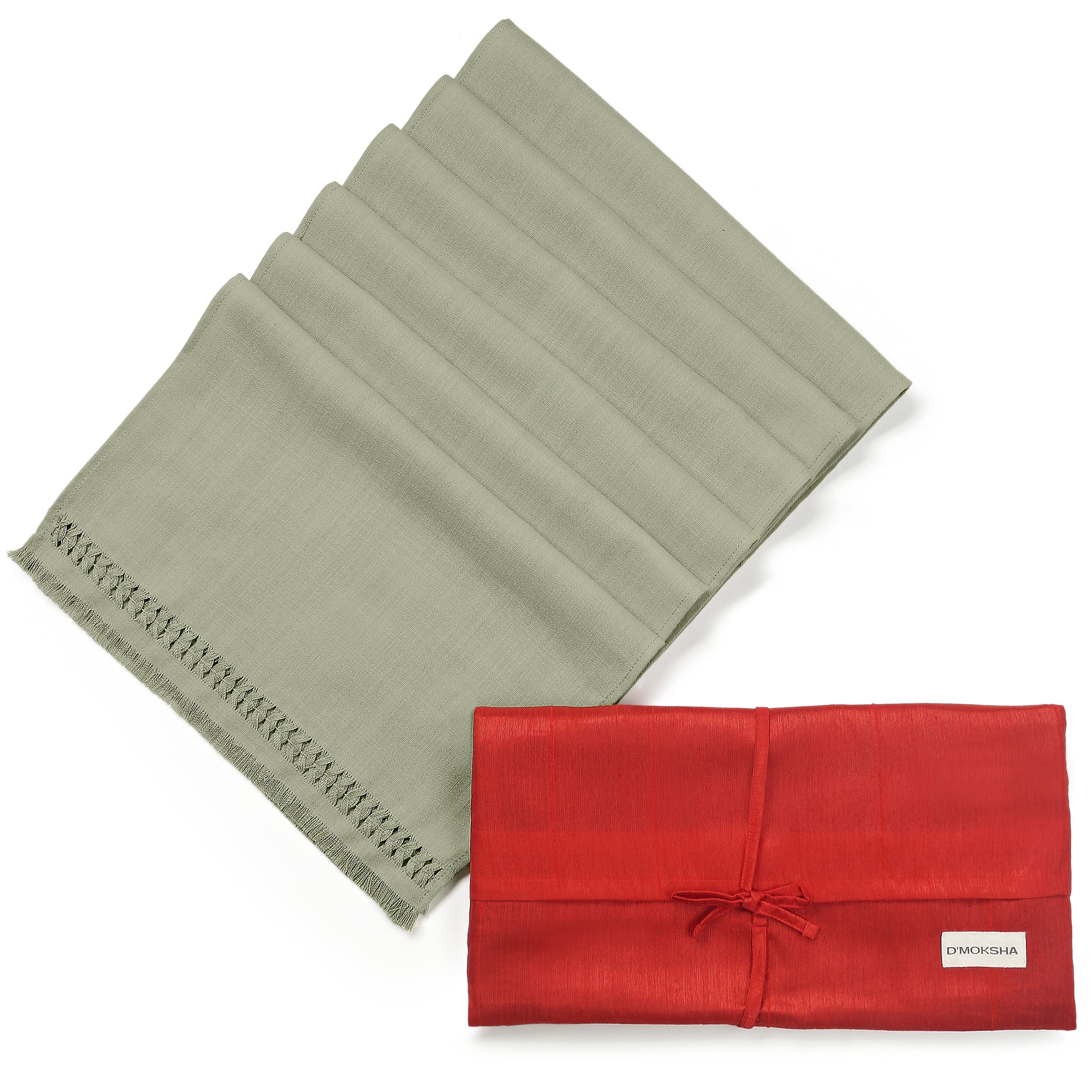 Sage green faux linen placemats in a set table setting