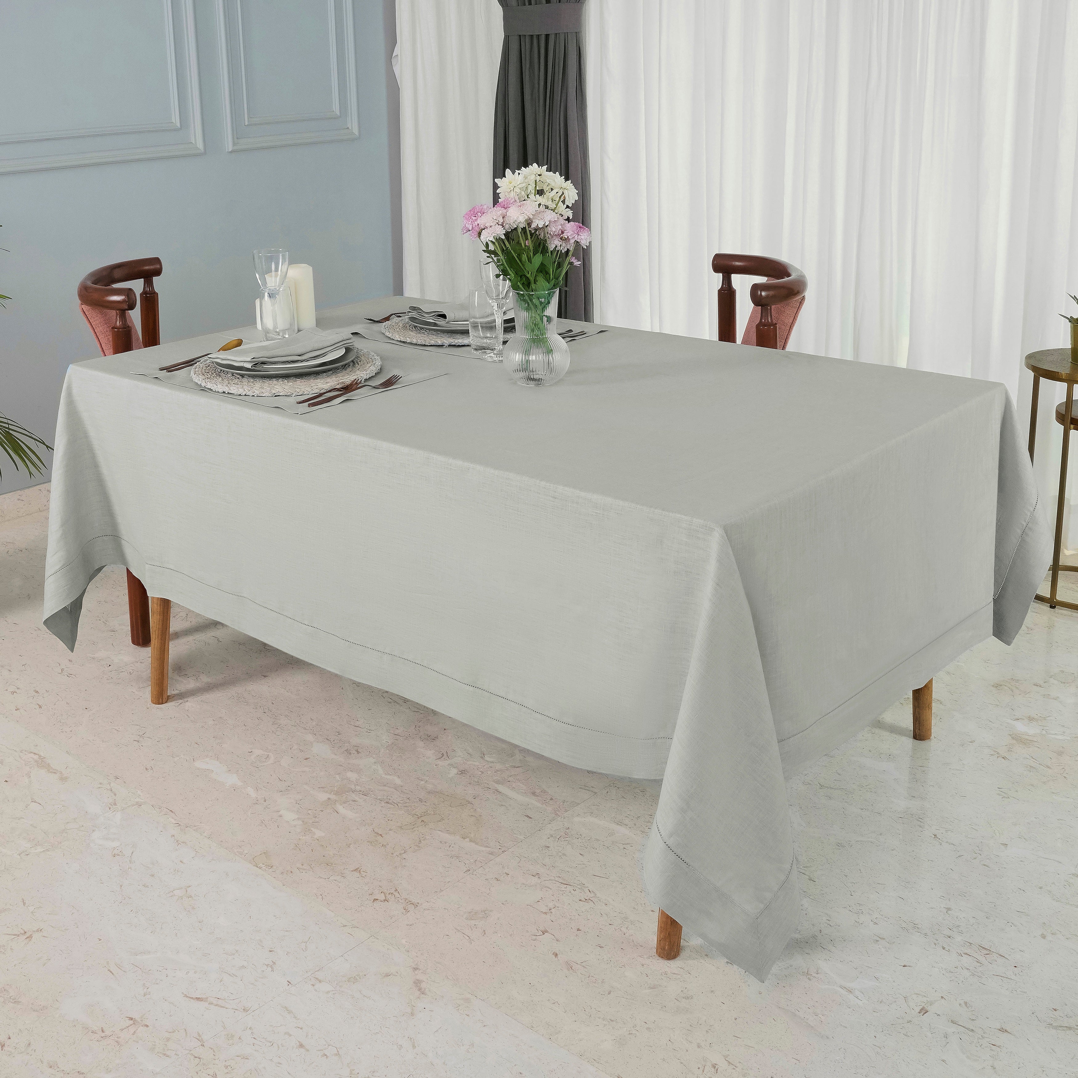 Silver grey pure linen tablecloth in a set table setting