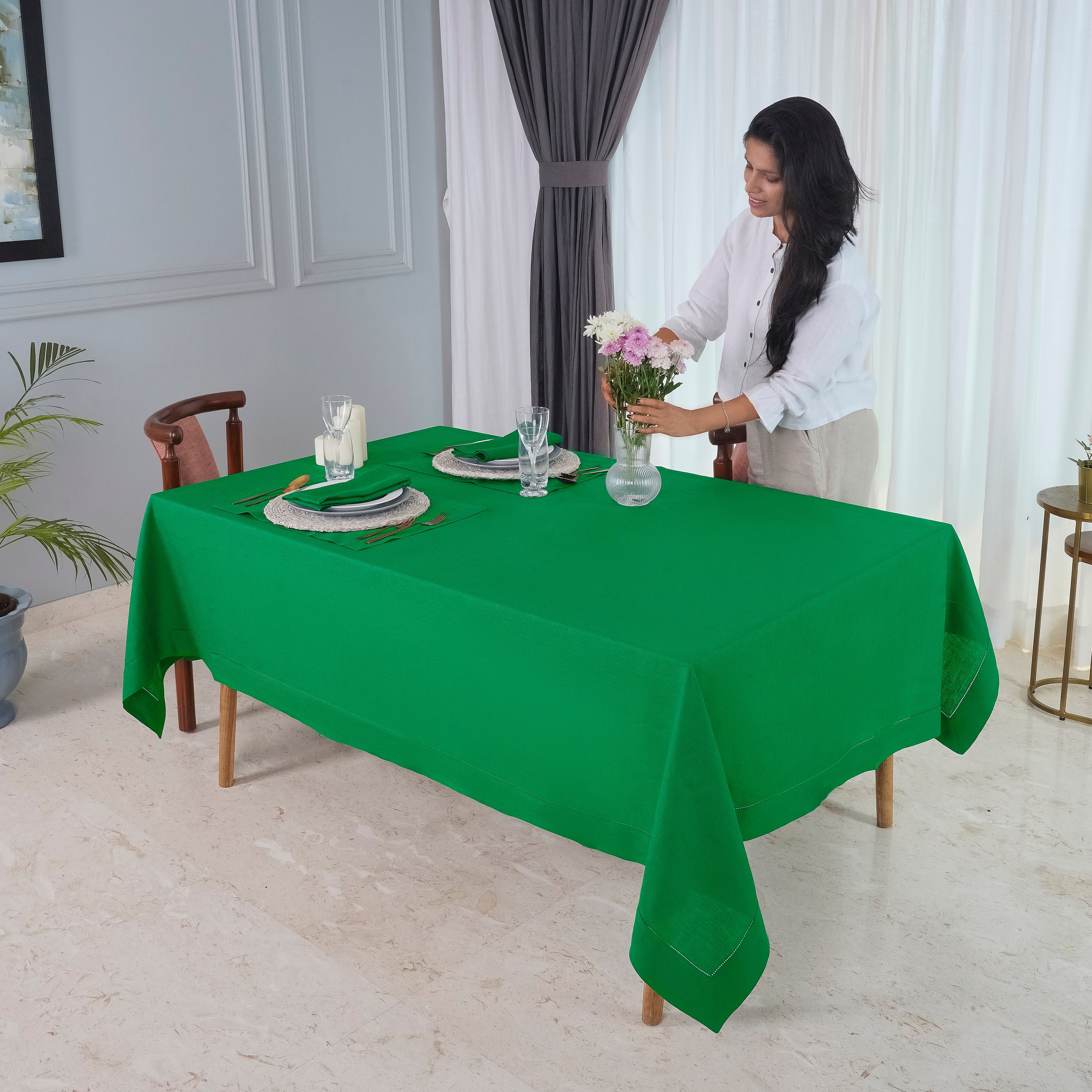 Kelly green pure linen tablecloth in a set table setting