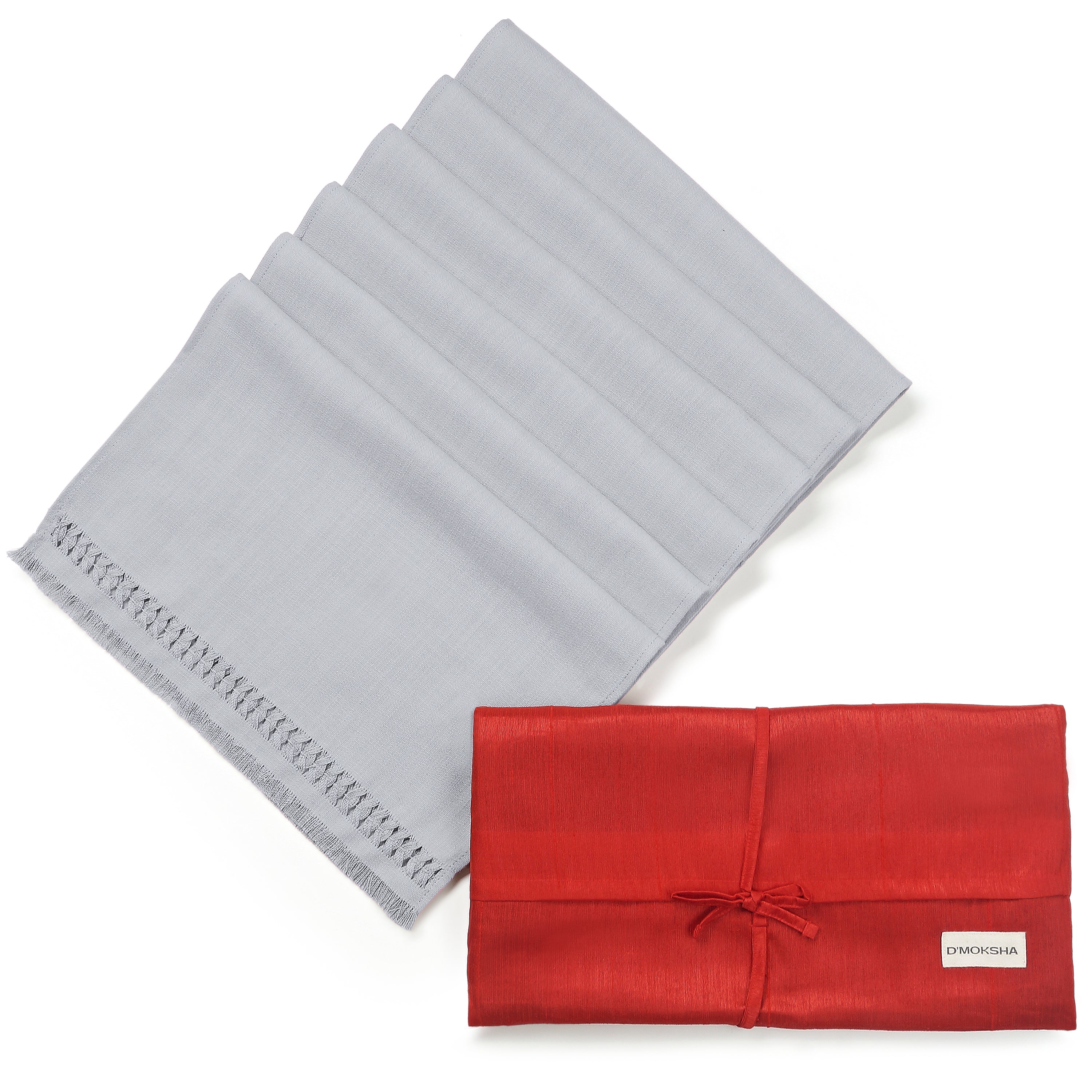 Light grey faux linen placemats in a set table setting