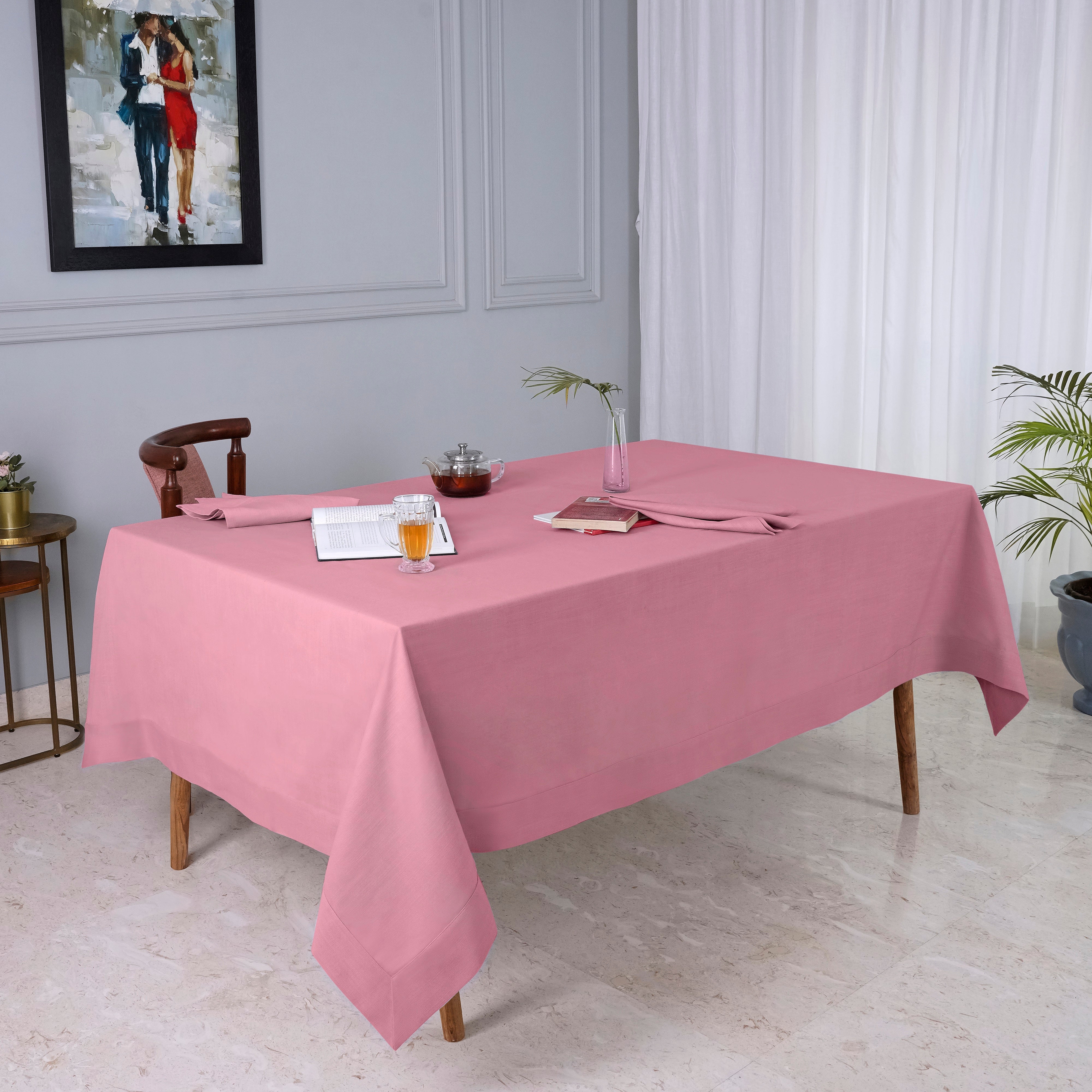 Dusty pink faux linen tablecloth in a set table setting