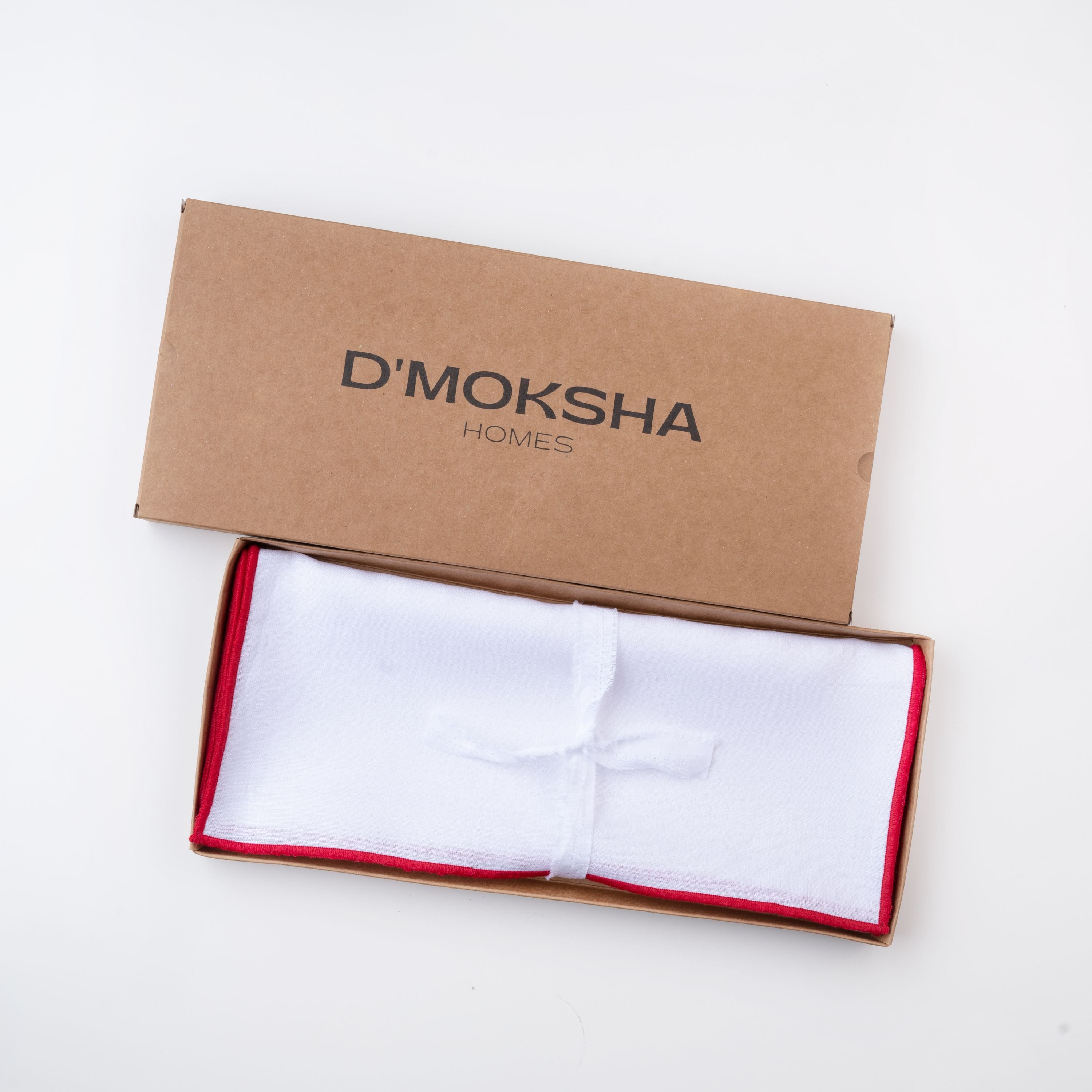 White and red pure linen placemats in a set table setting