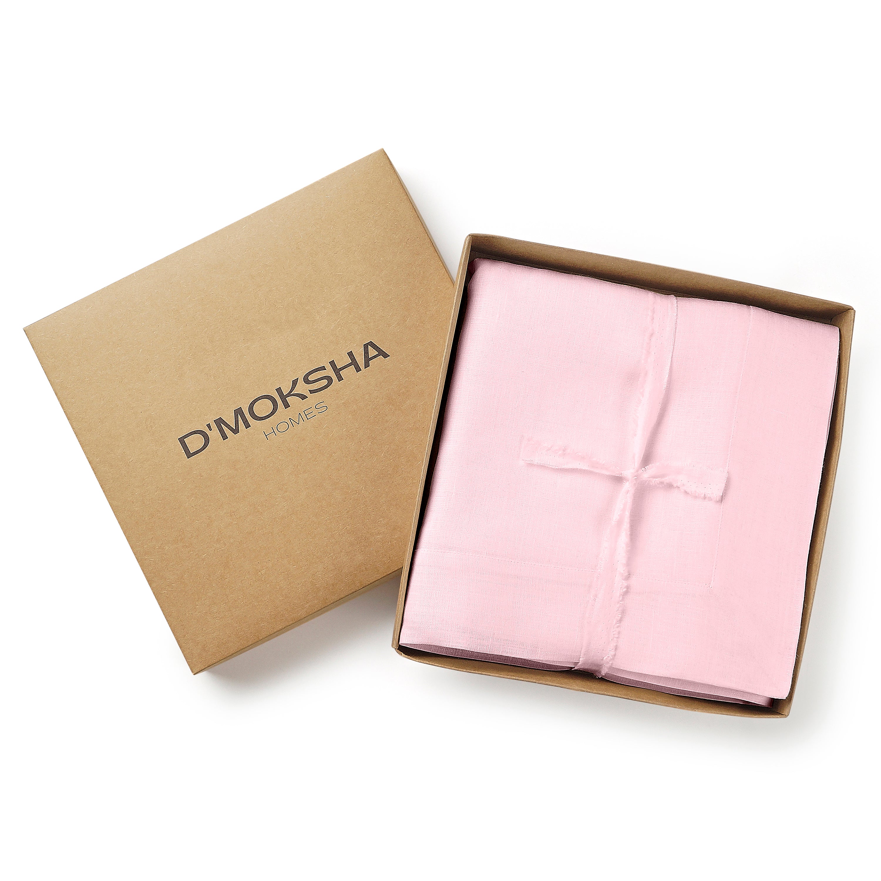 Pastel pink pure linen tablecloth in a set table setting