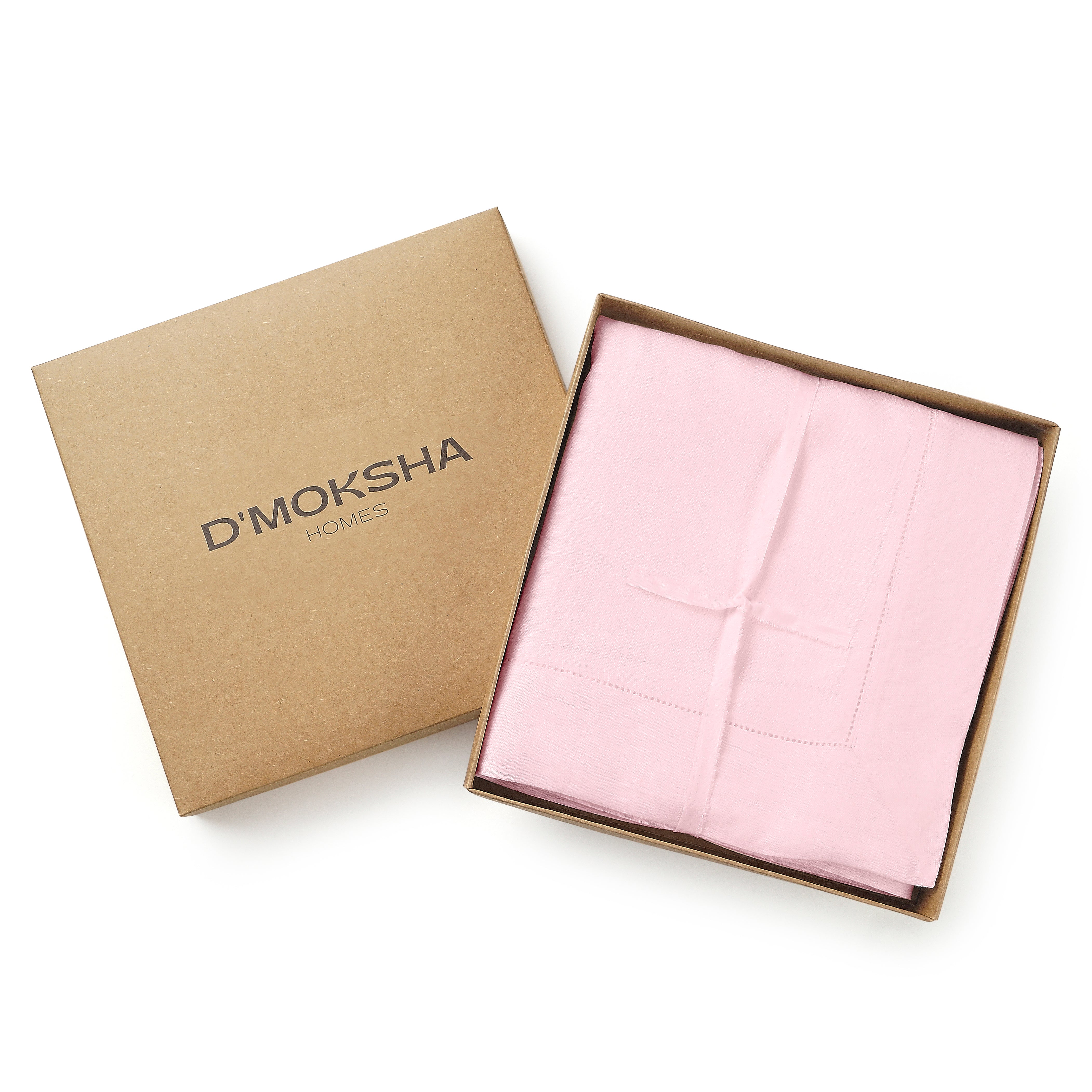 Pastel pink pure linen tablecloth in a set table setting