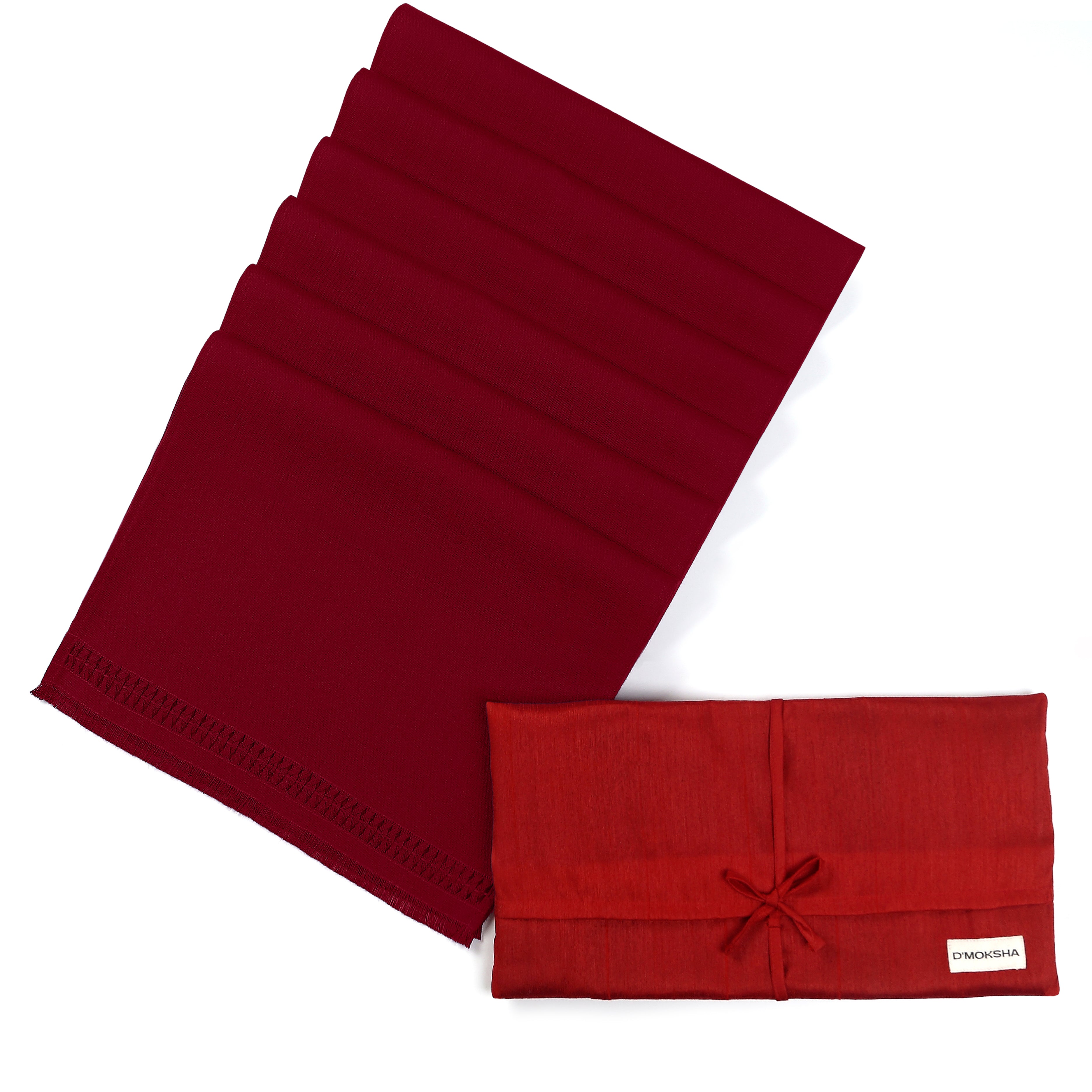 Red faux linen dinner napkins folded to show fabric texture