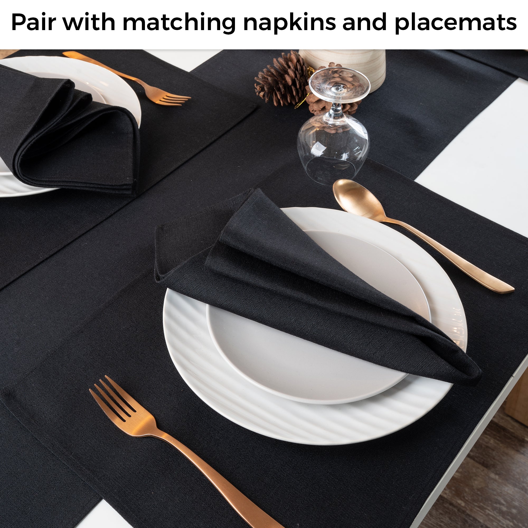 Black faux linen table runner in a set table setting