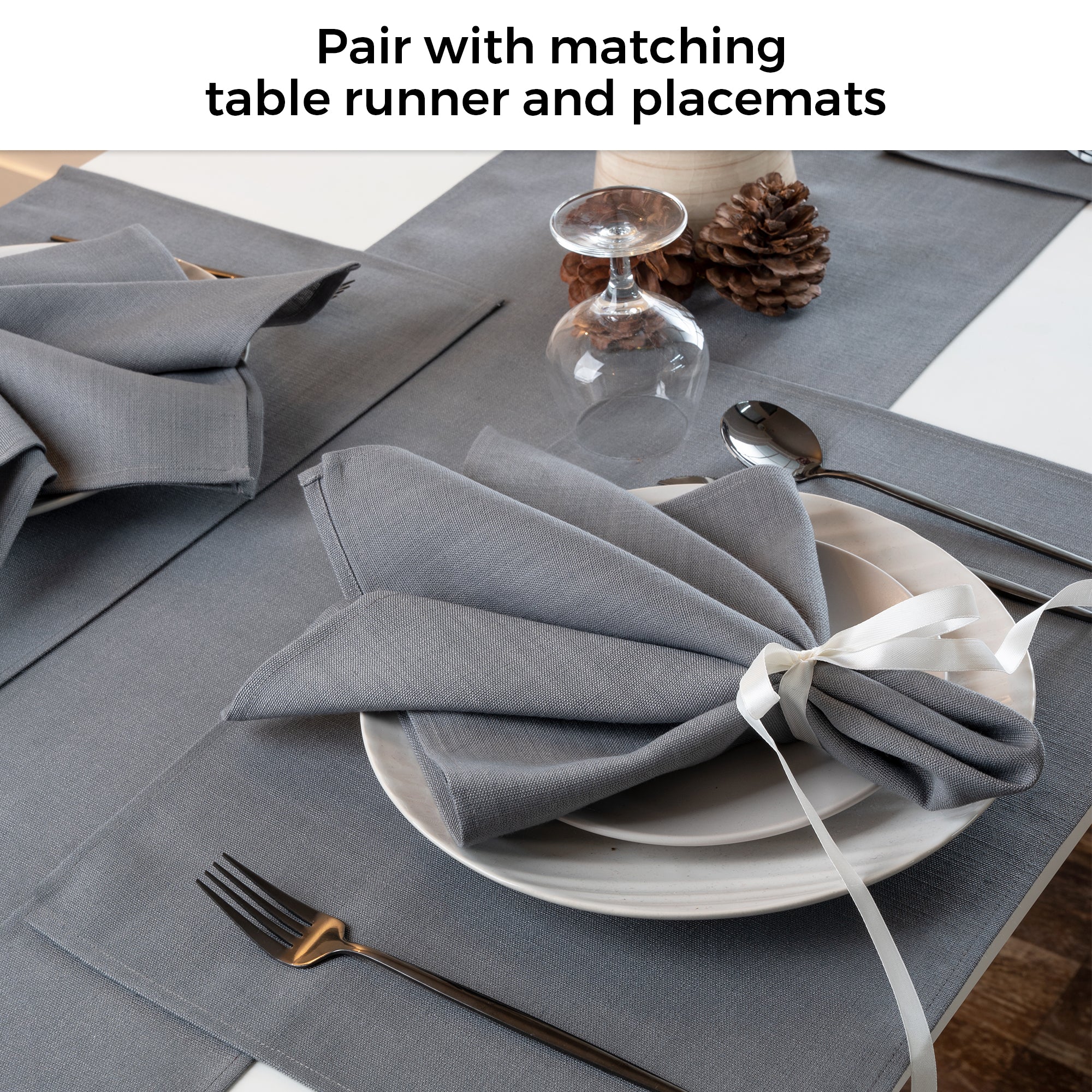 Charcoal grey faux linen placemats in a set table setting
