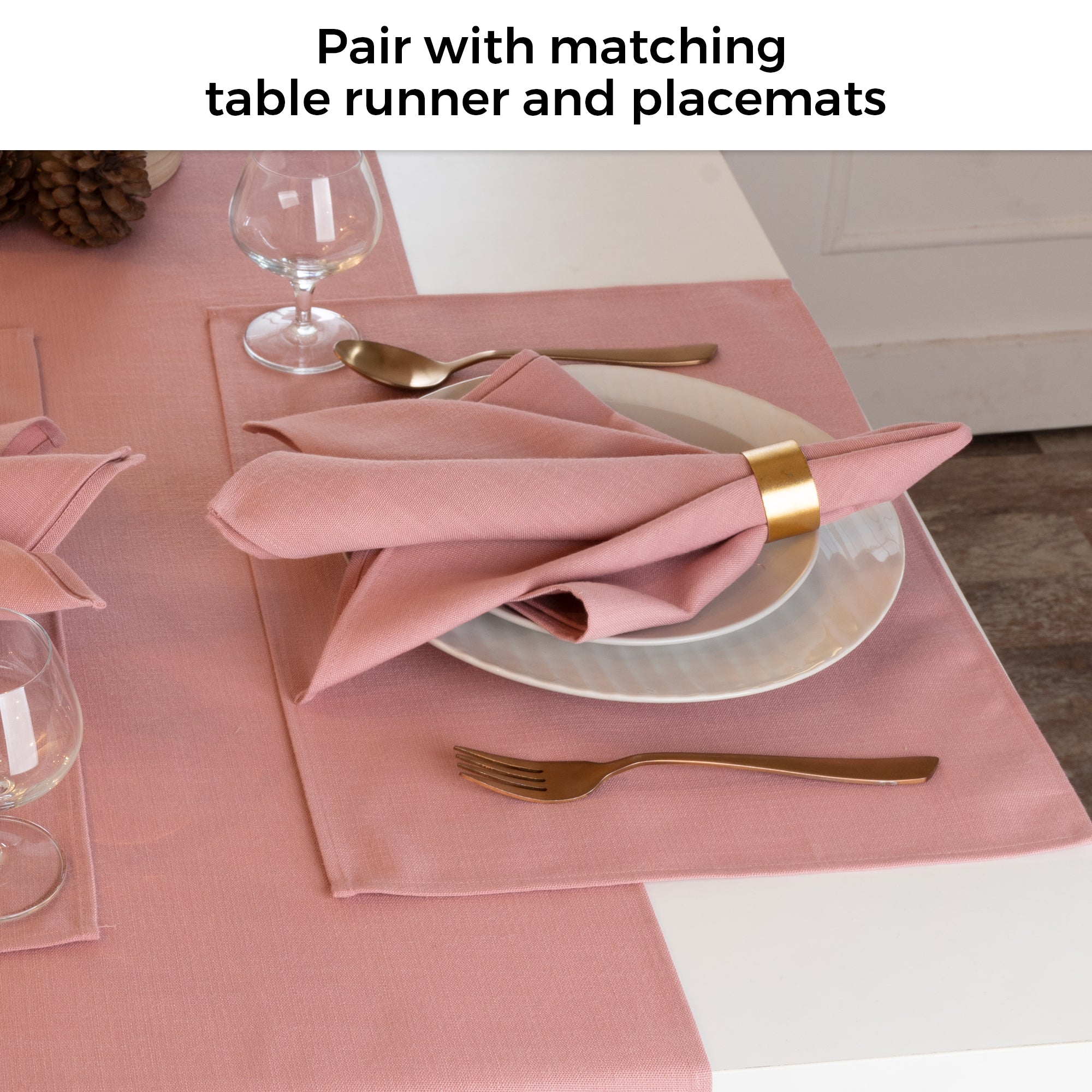 Dusty pink faux linen placemats in a set table setting