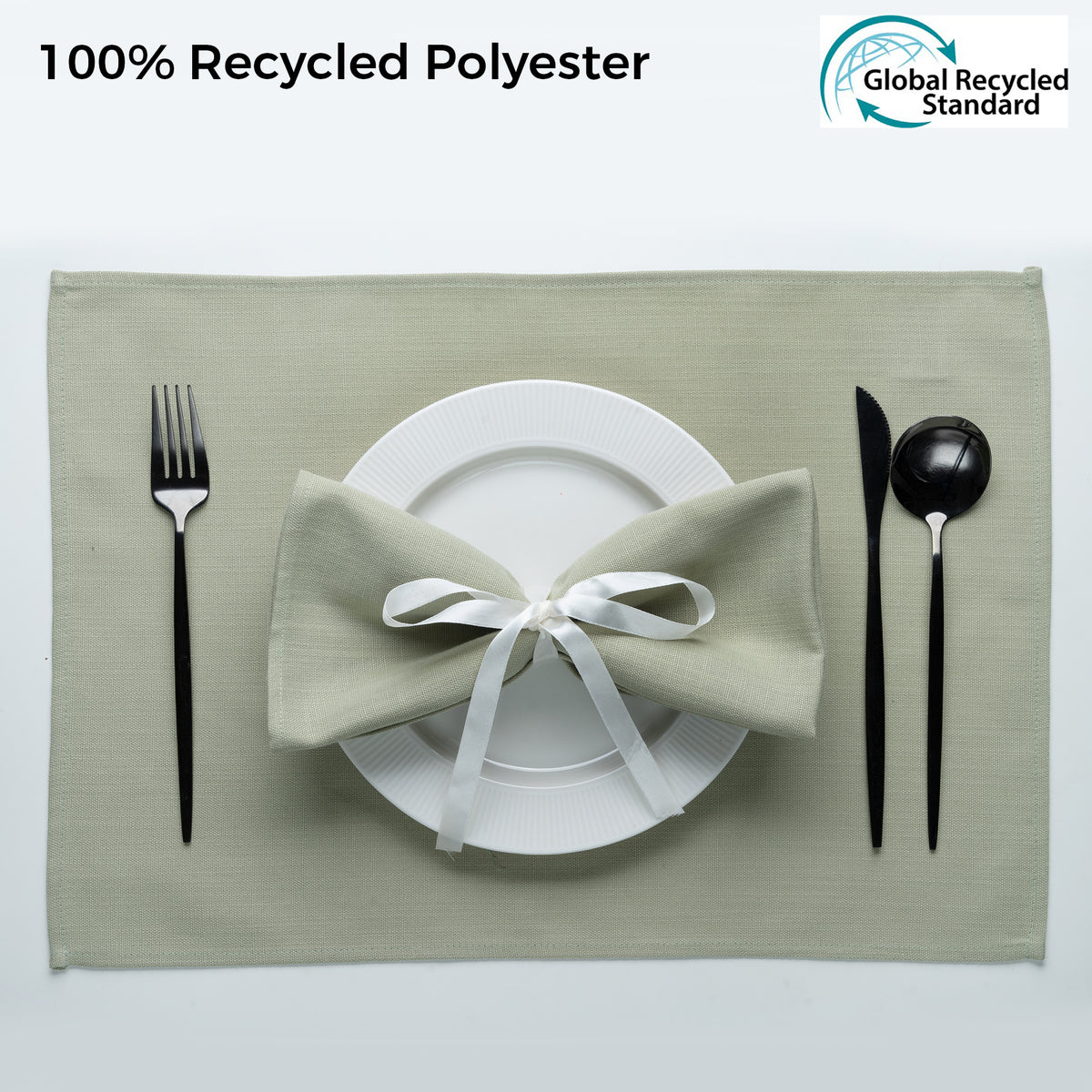 Sage green faux linen dinner napkins styled on a dining table