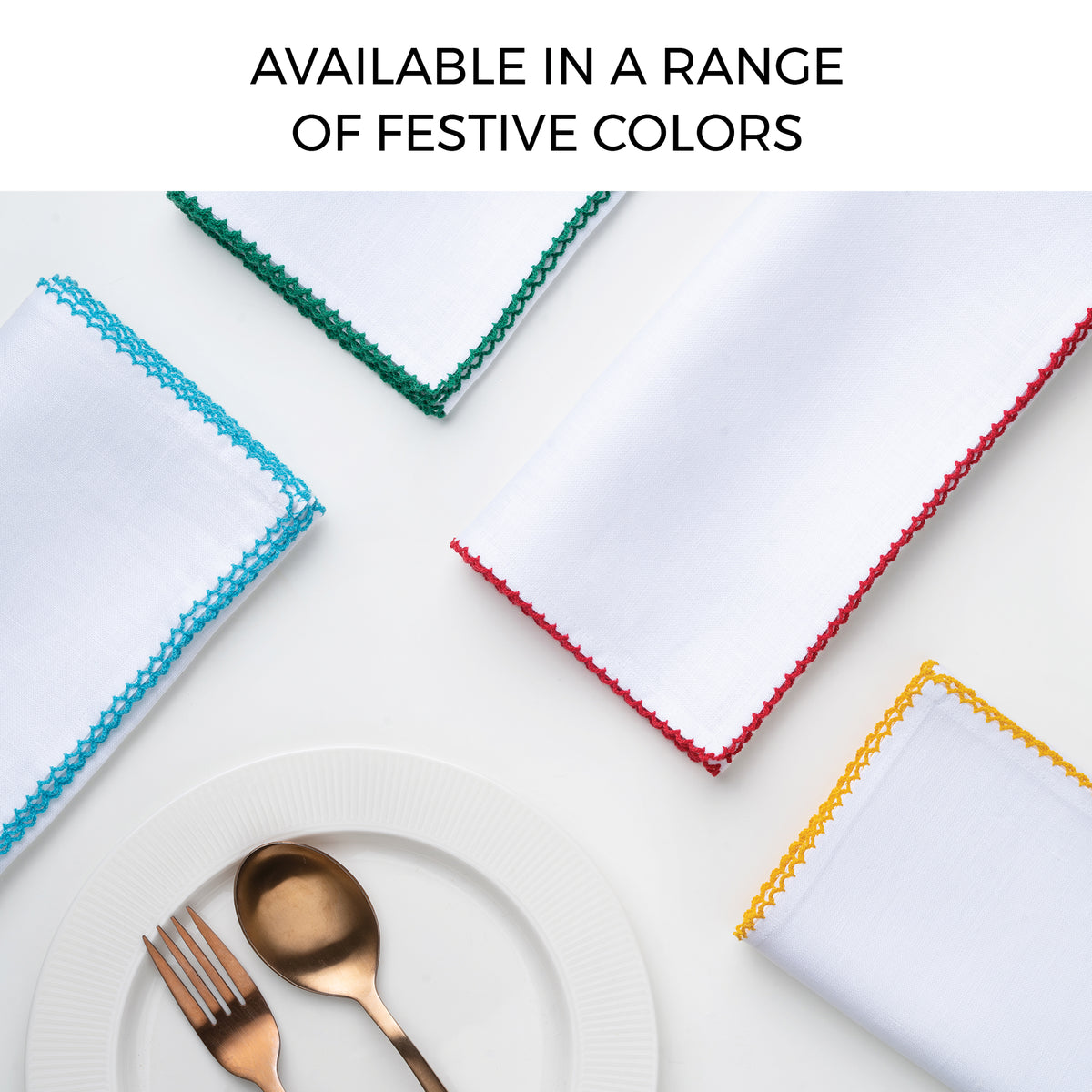 White and navy blue pure linen dinner napkins folded to show fabric texture