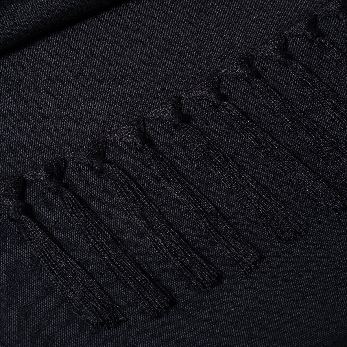Close-up of the weave on a black faux linen table runner