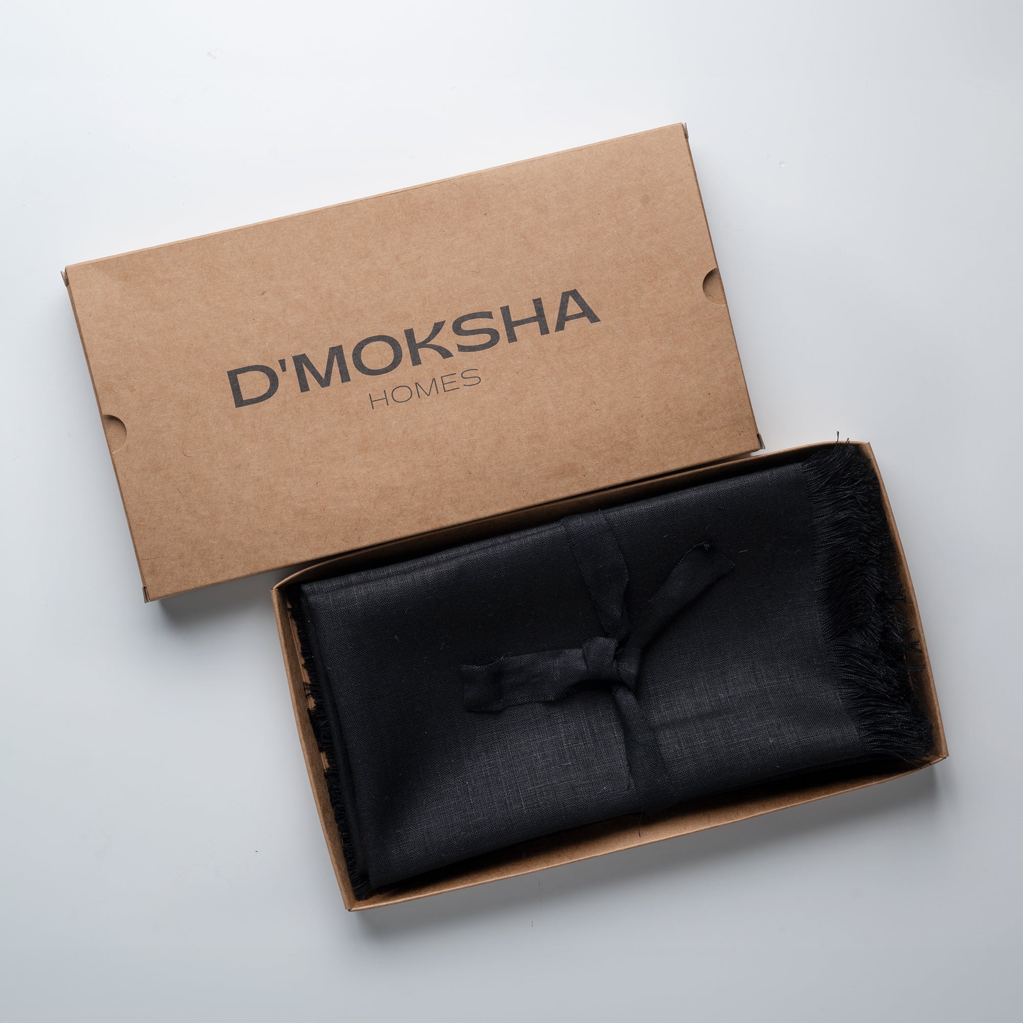 Black pure linen dinner napkins in a set table setting