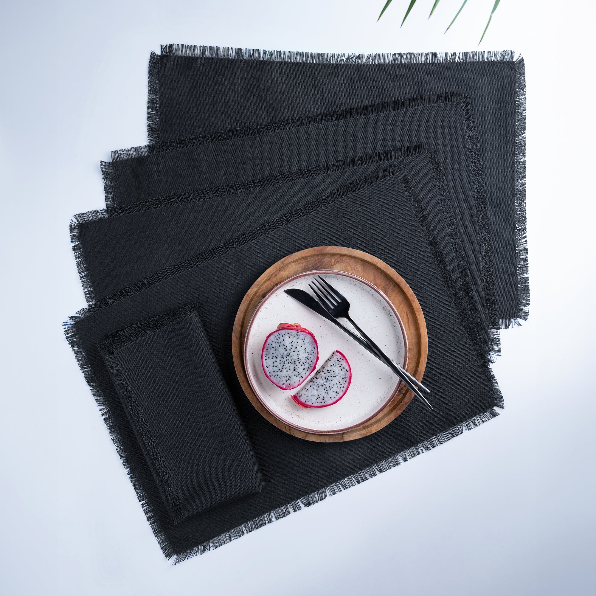 Black faux linen placemats with fringed edge, 14 x 19 inches, set of 4