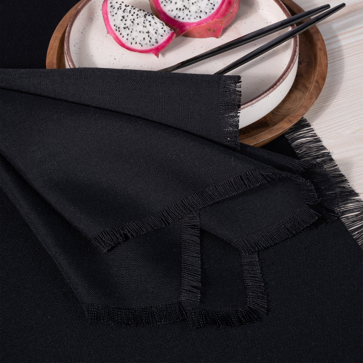 Black faux linen dinner napkins with matching D'Moksha table linens