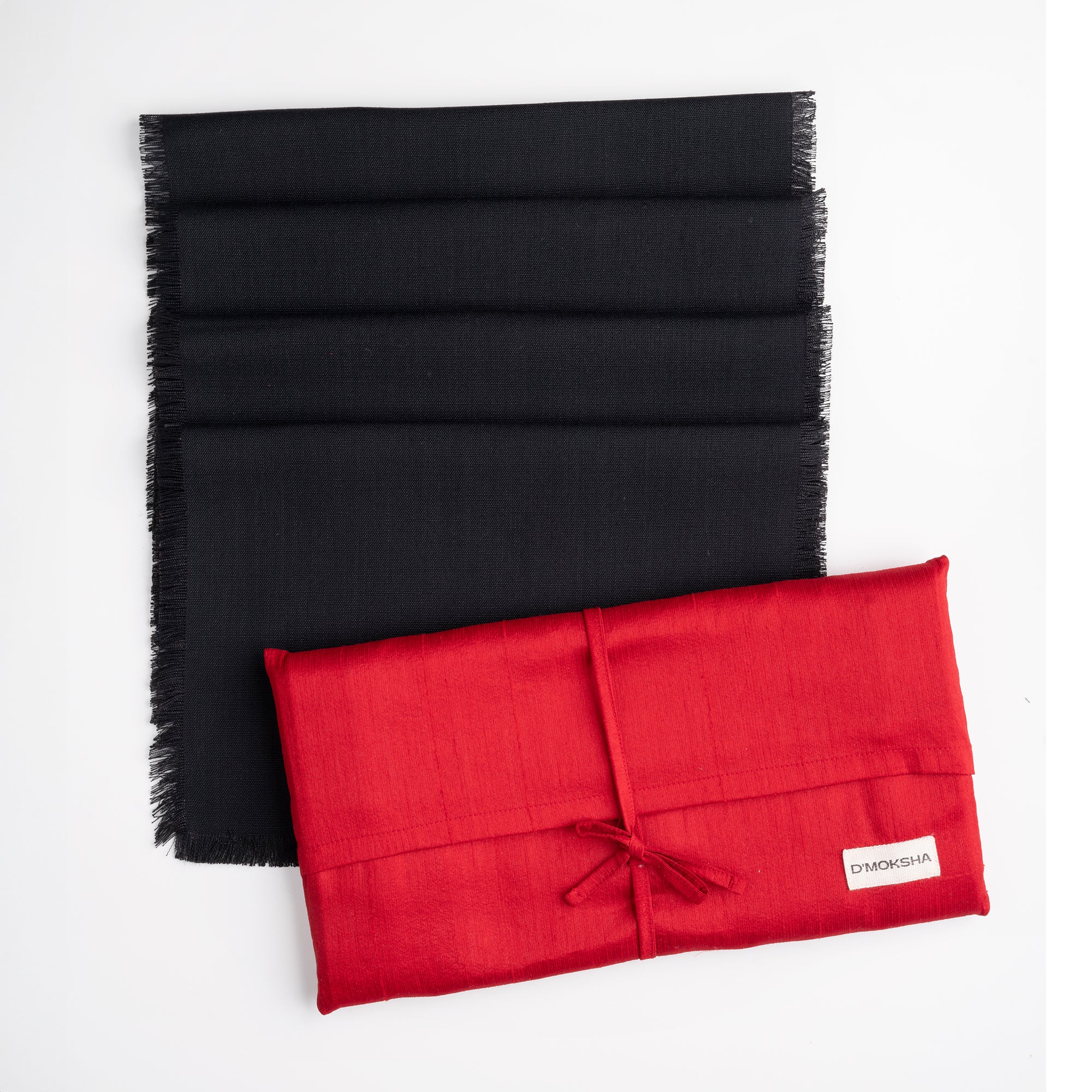 Black faux linen placemats in a set table setting