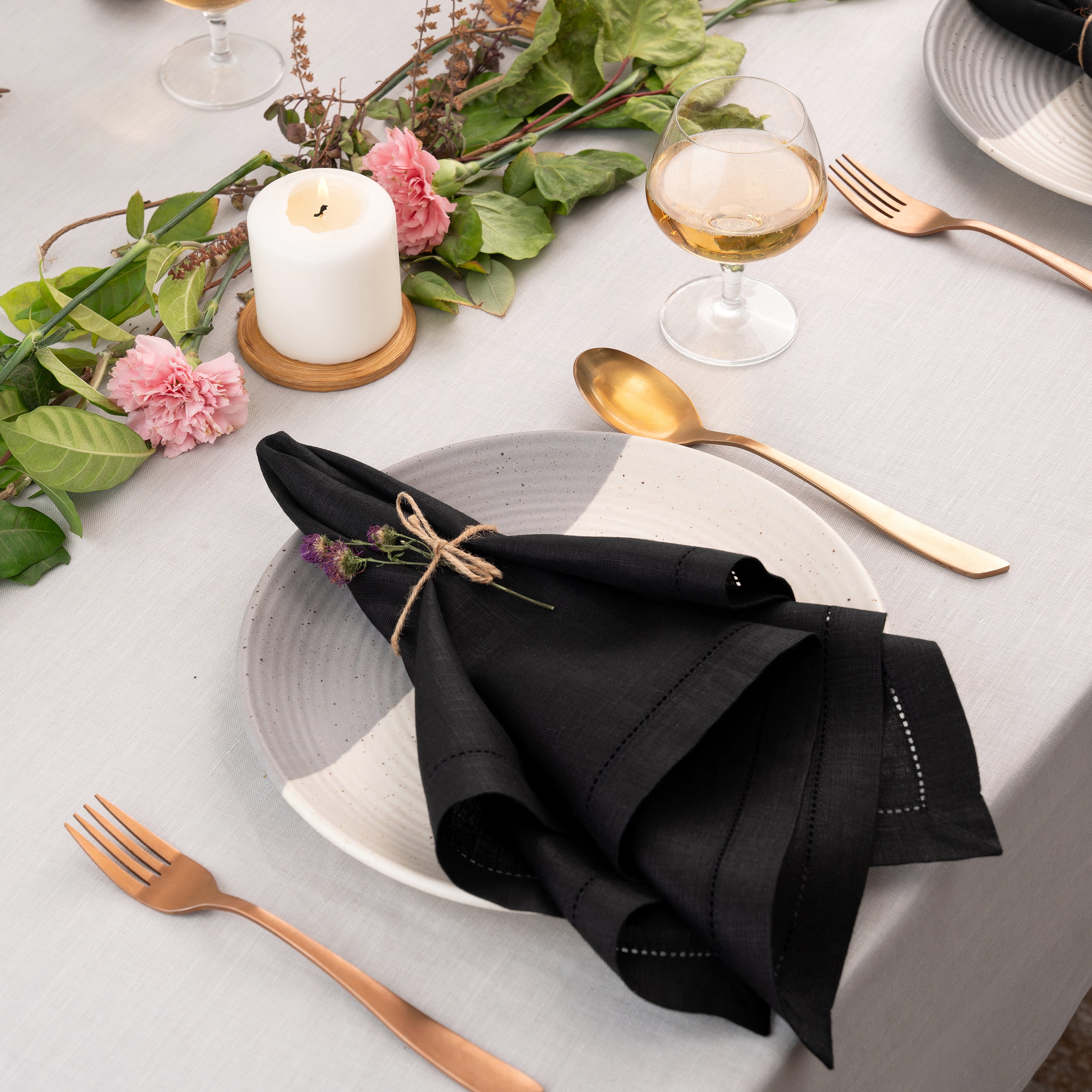 Close-up of the hemstitch edge on black pure linen dinner napkins