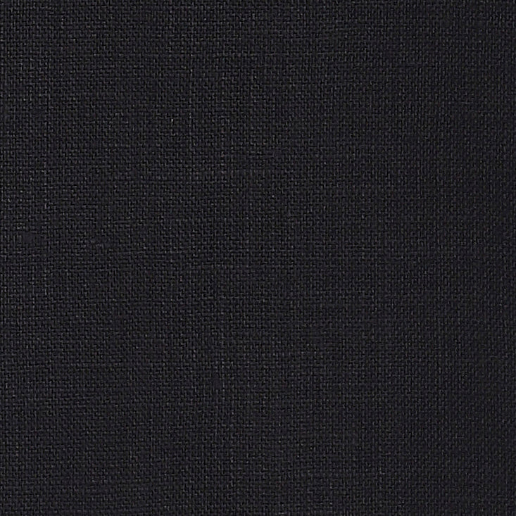 Black pure linen dinner napkins styled on a dining table