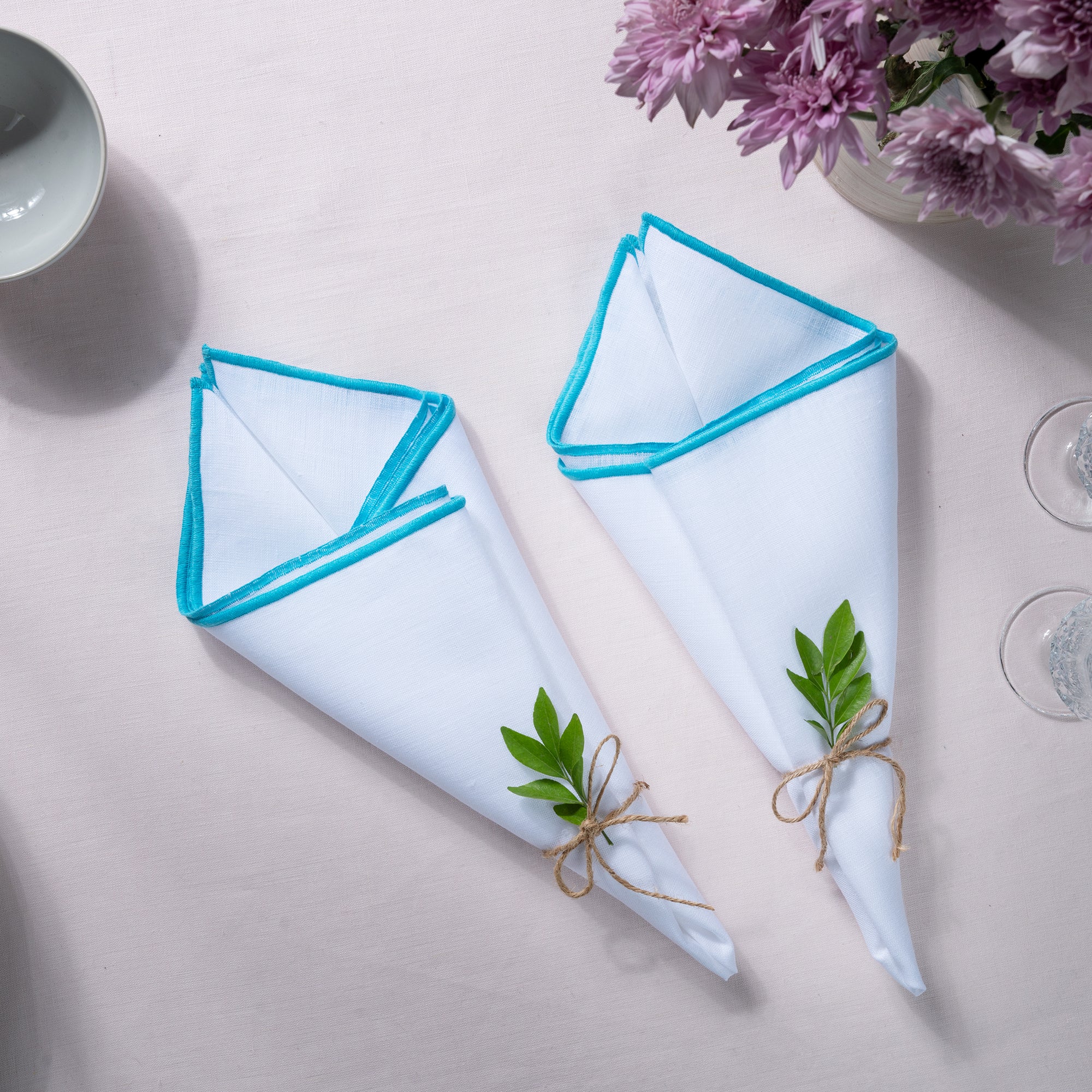 White and blue pure linen dinner napkins with matching D'Moksha table linens
