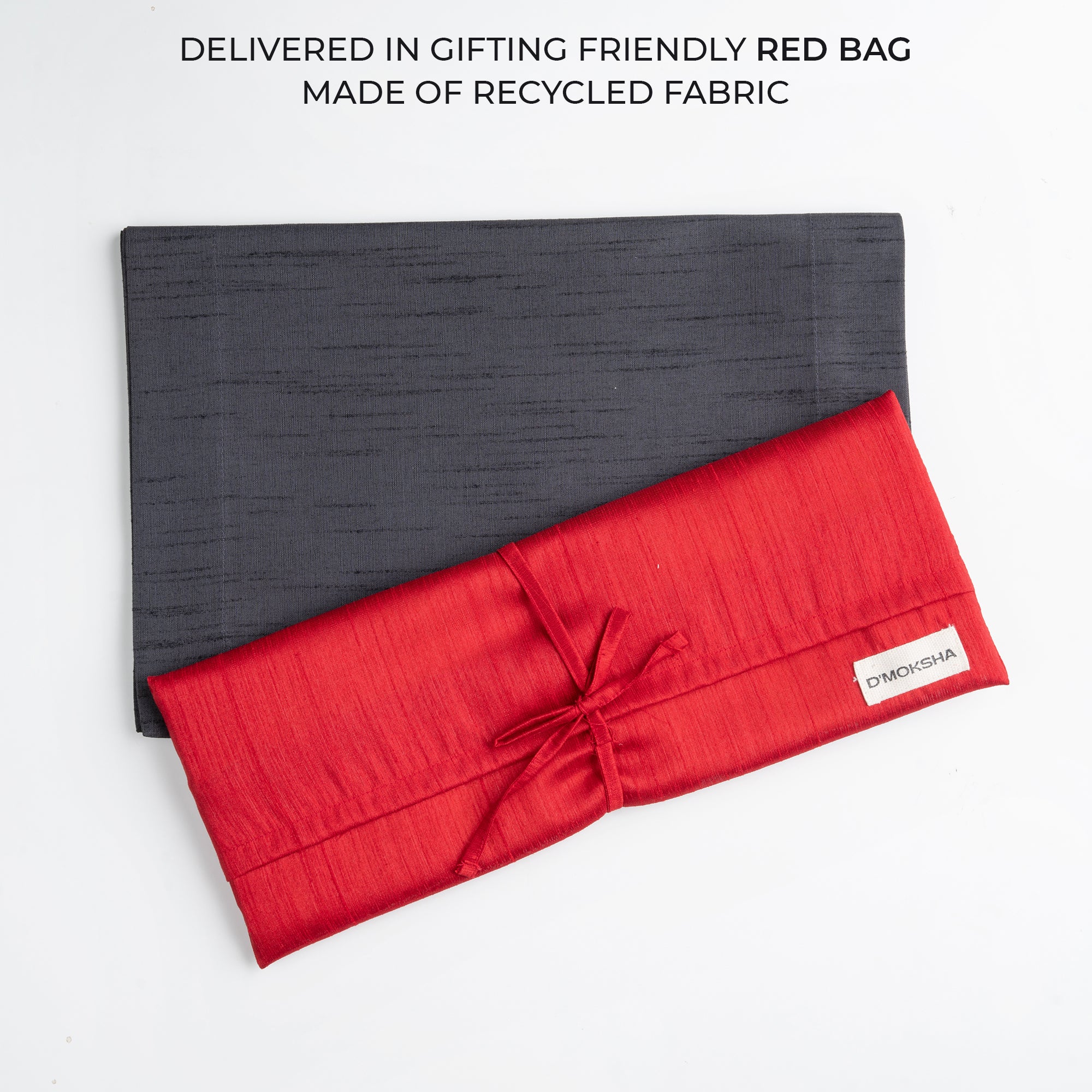Charcoal grey Luxe Shine placemats with matching D'Moksha table linens