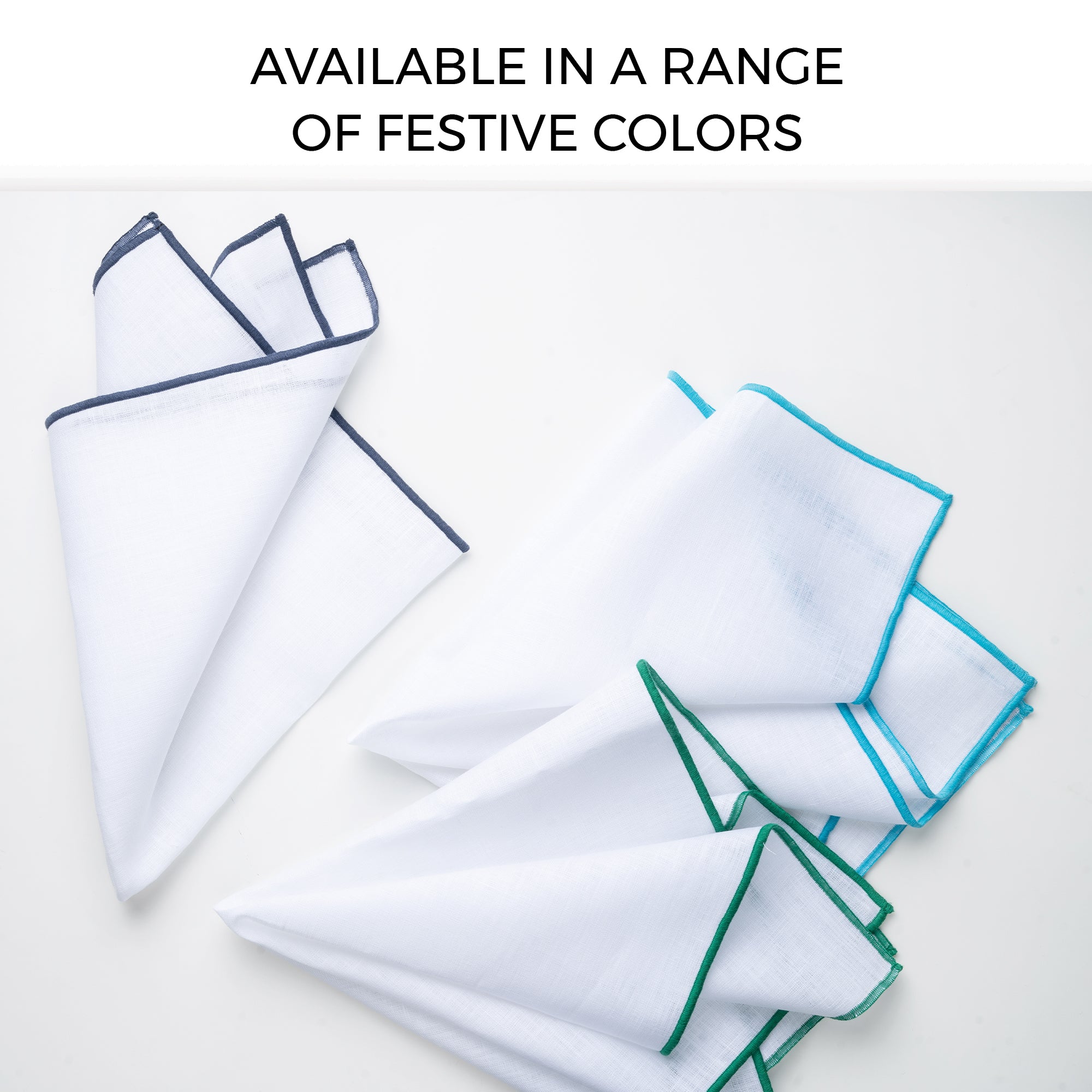 White and navy blue pure linen dinner napkins in a set table setting