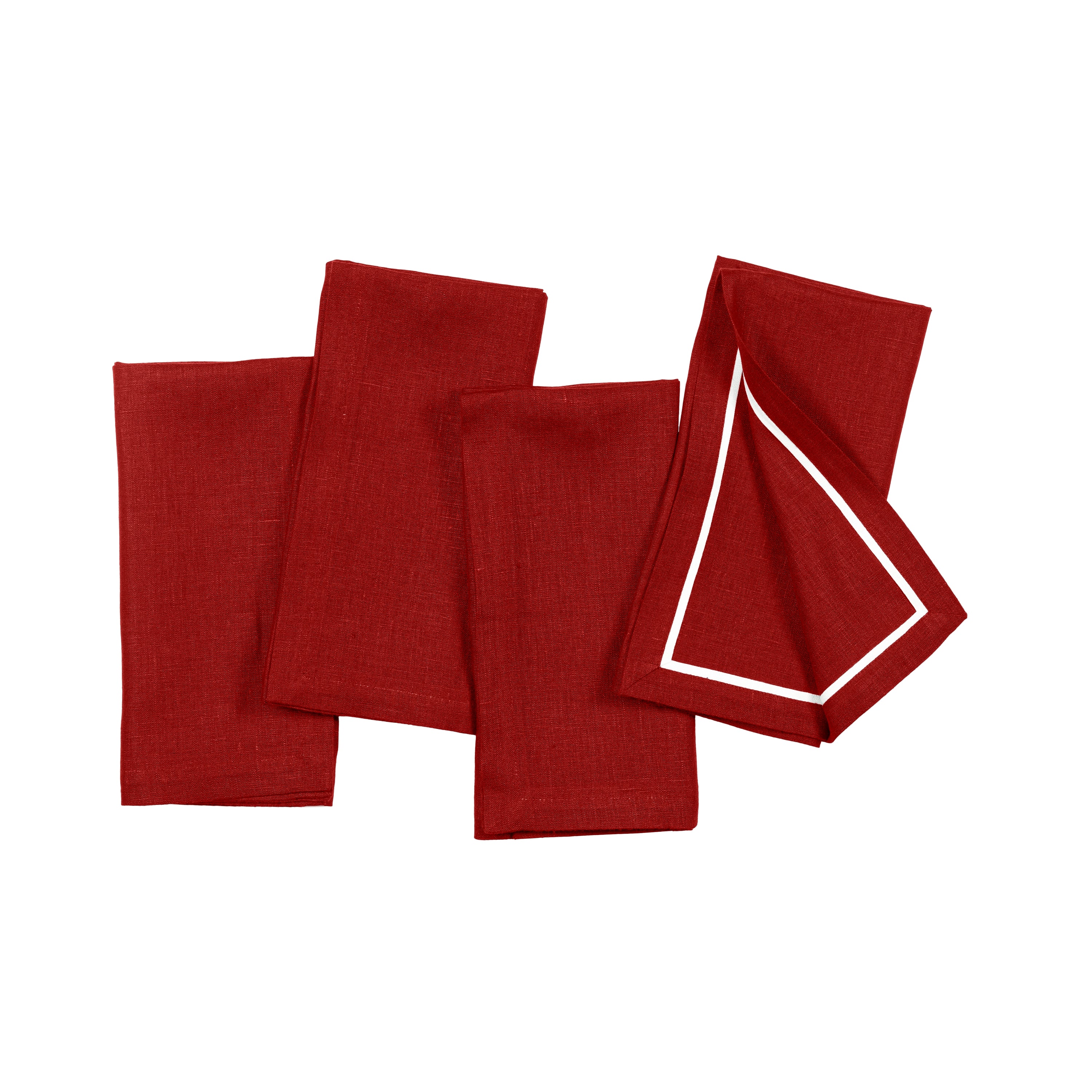Red and white pure linen dinner napkins styled on a dining table