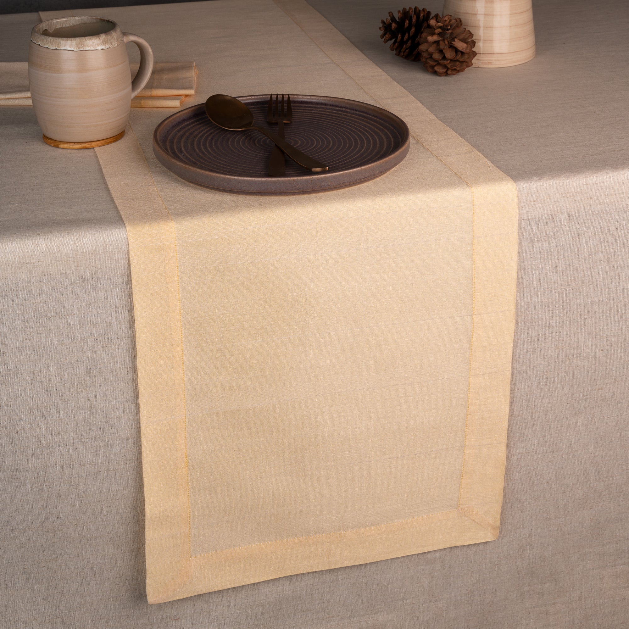 Cream Luxe Shine table runner with mitered corners, 14 x 36 inches