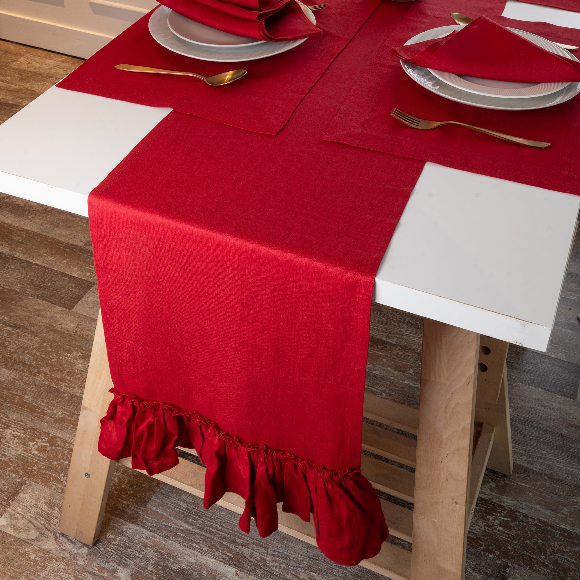 Close-up of the ruffled edge on a red pure linen table runner