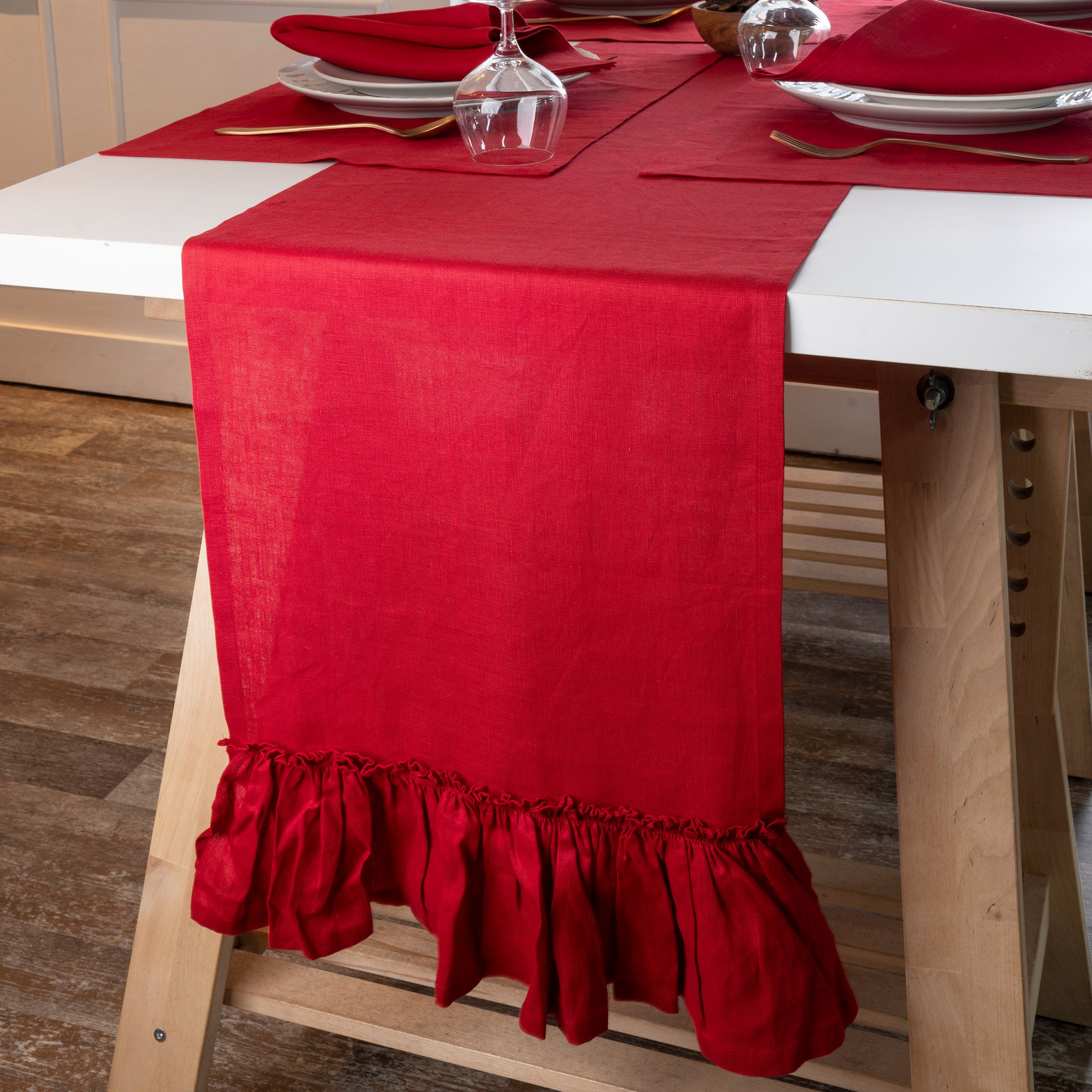 Red pure linen table runner styled on a dining table