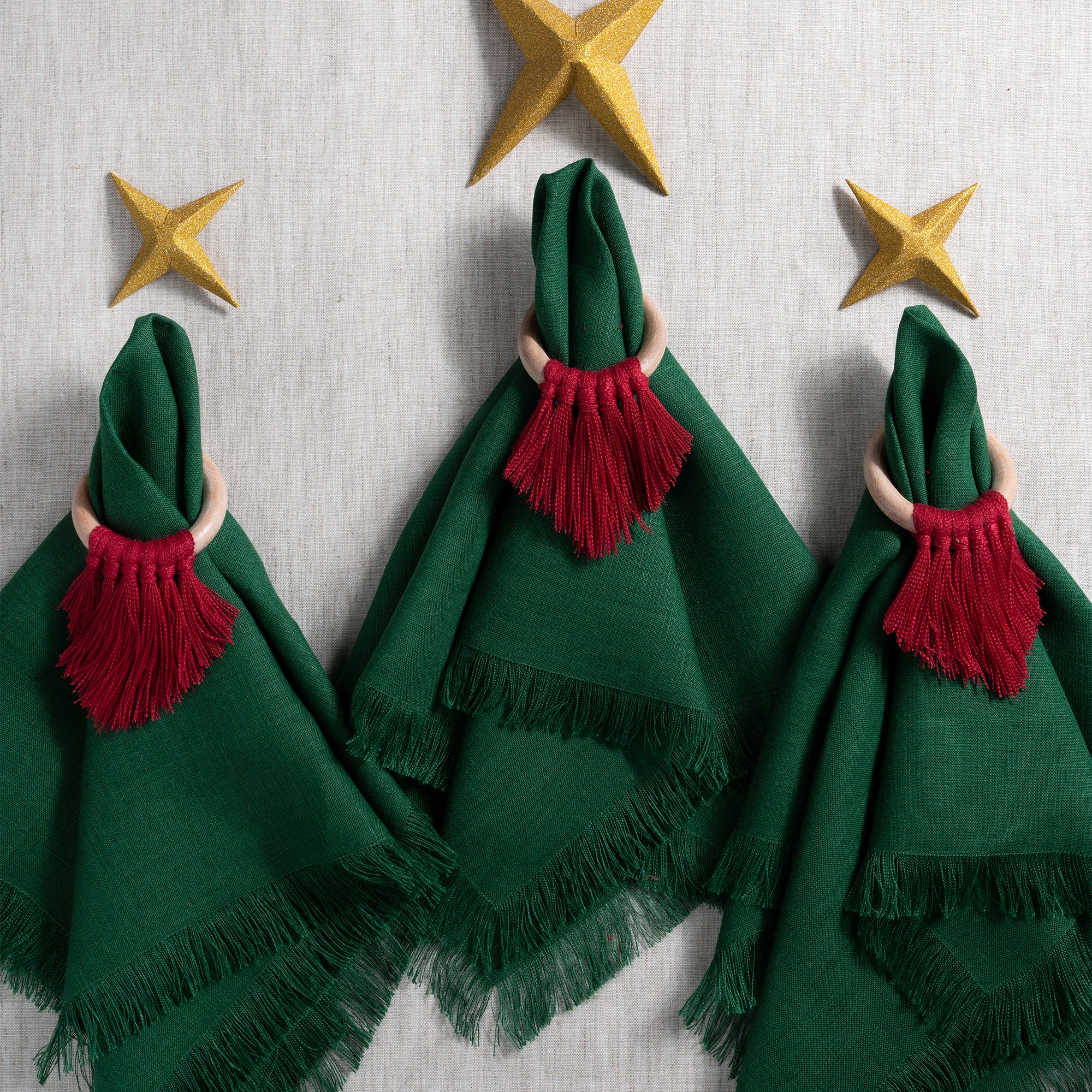 Close-up of the fringed edge on forest green pure linen dinner napkins