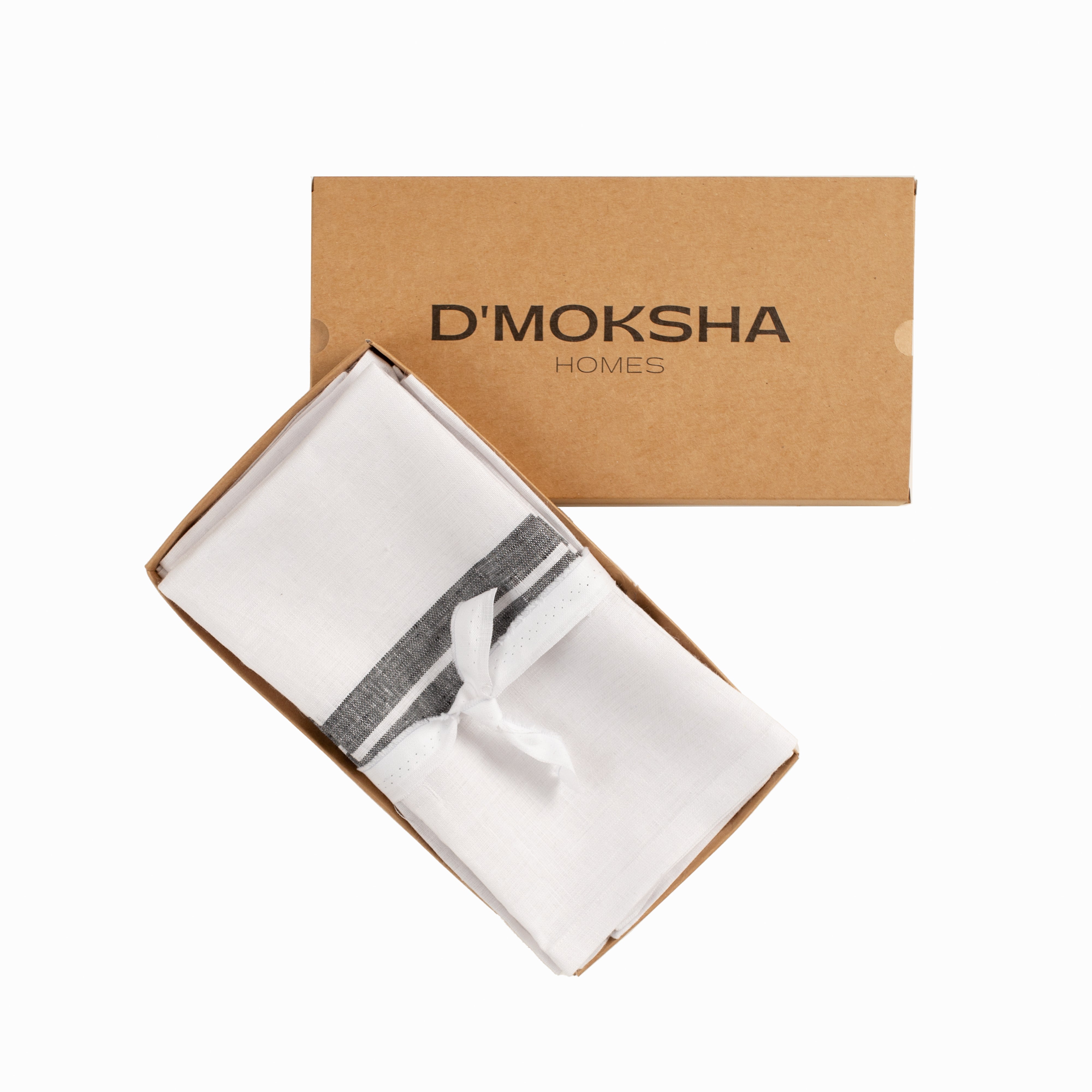 White and black pure linen dinner napkins with matching D'Moksha table linens