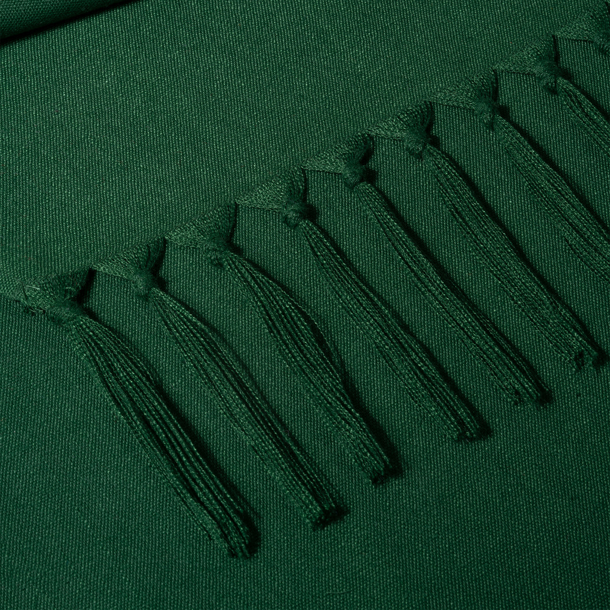 Close-up of the weave on an eden green faux linen table runner