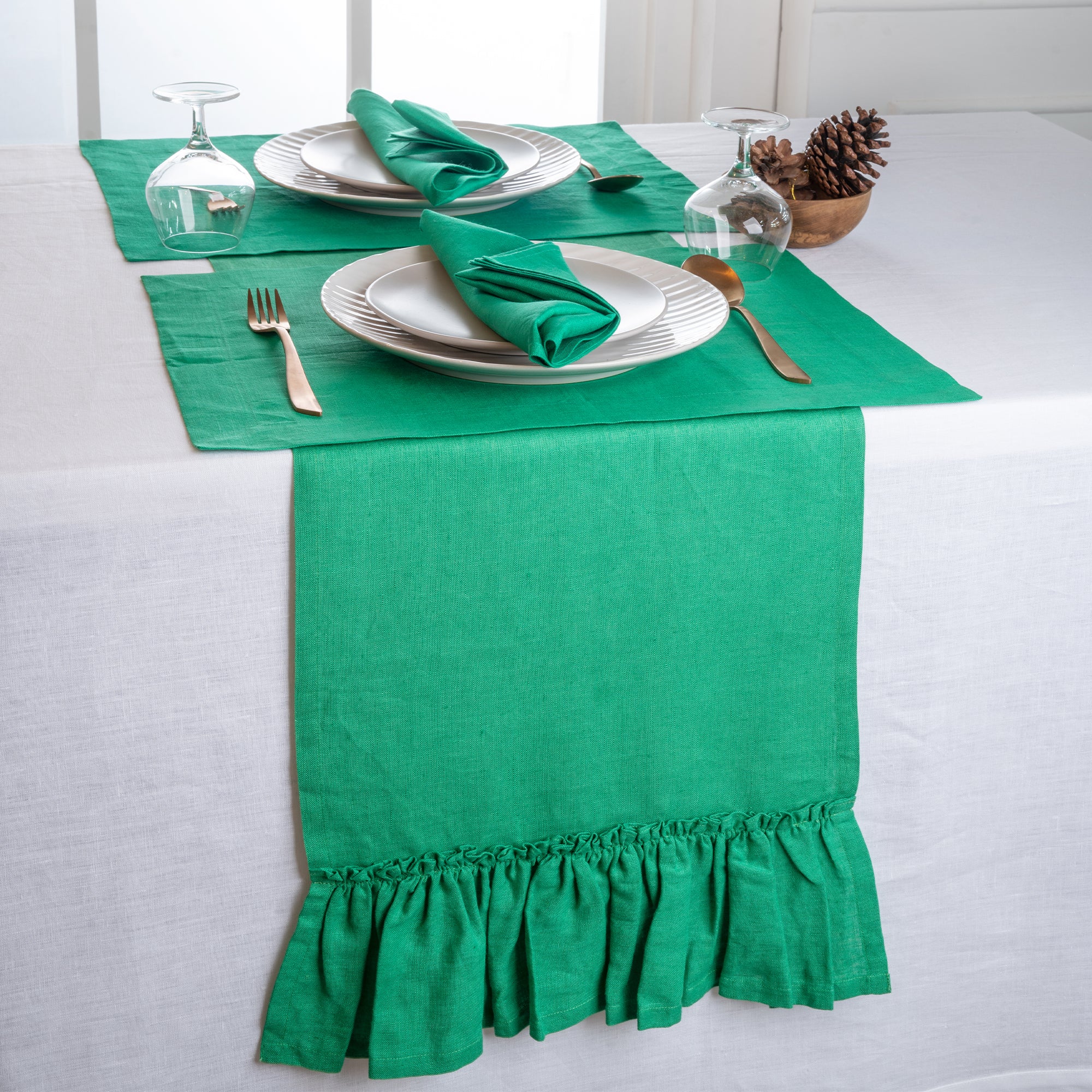 Kelly green pure linen table runner folded to show fabric texture