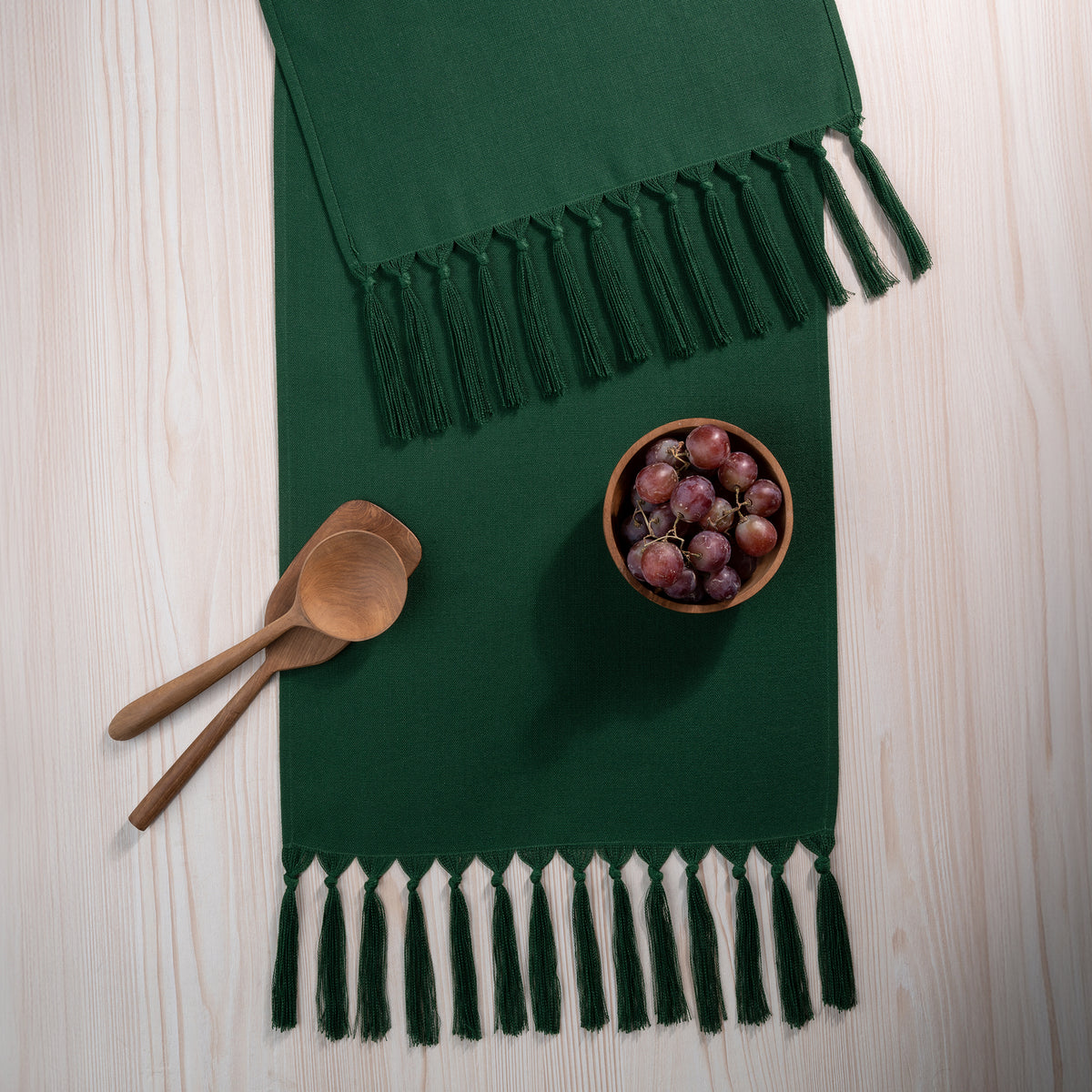 Eden green faux linen table runner with matching D'Moksha table linens