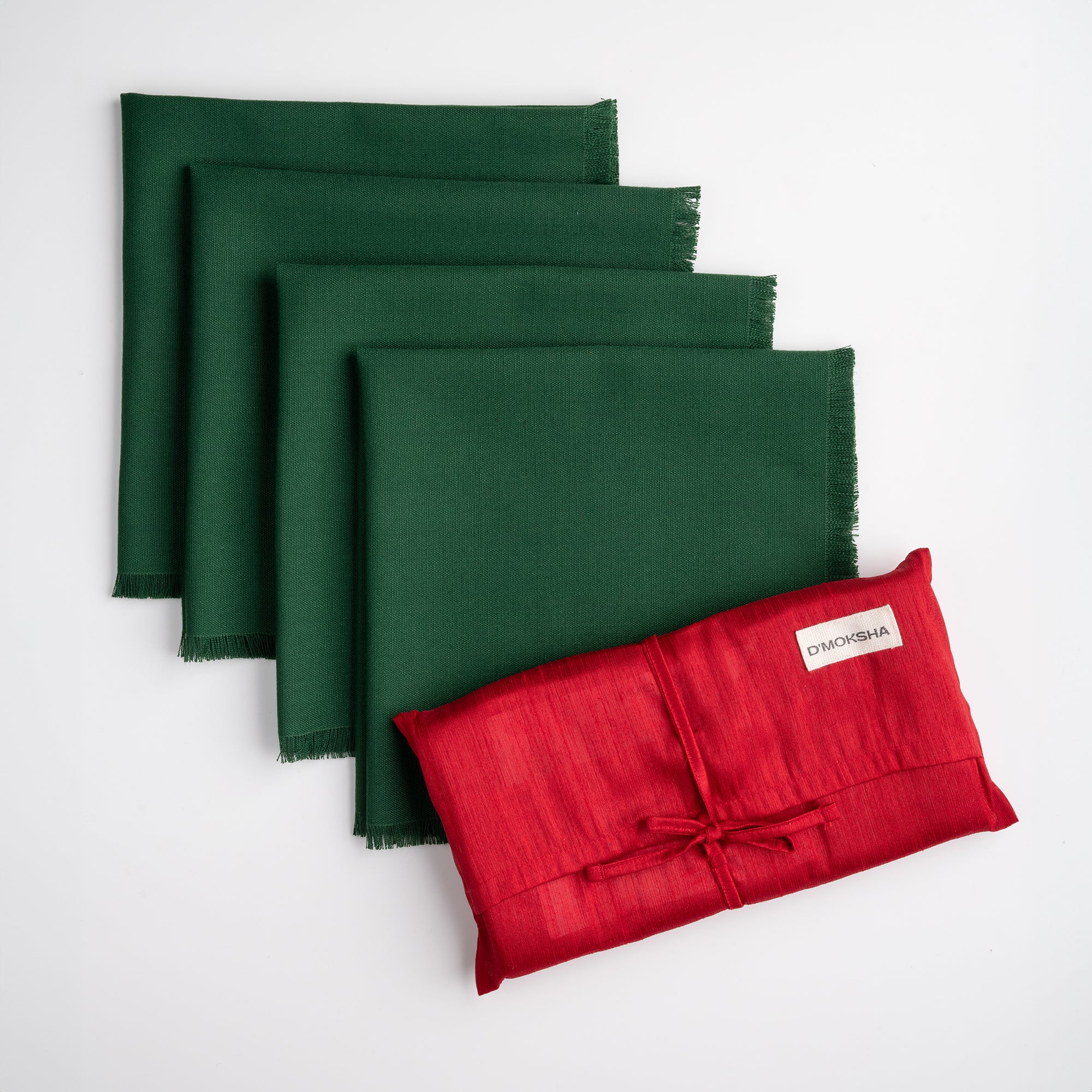 Eden green faux linen dinner napkins folded to show fabric texture