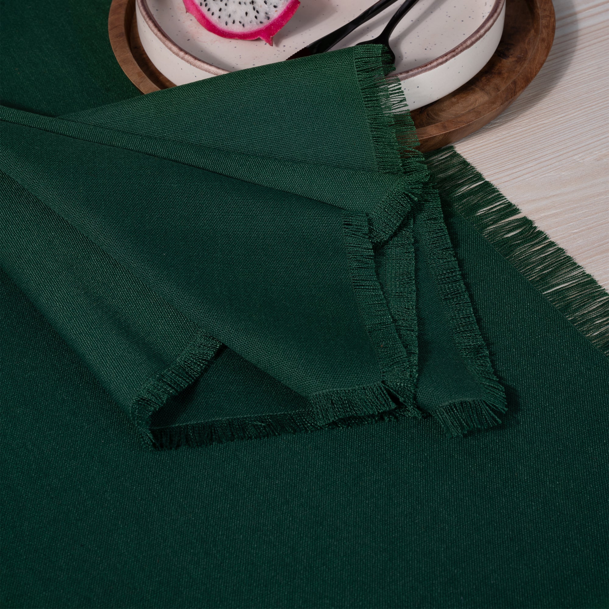 Eden green faux linen dinner napkins with matching D'Moksha table linens