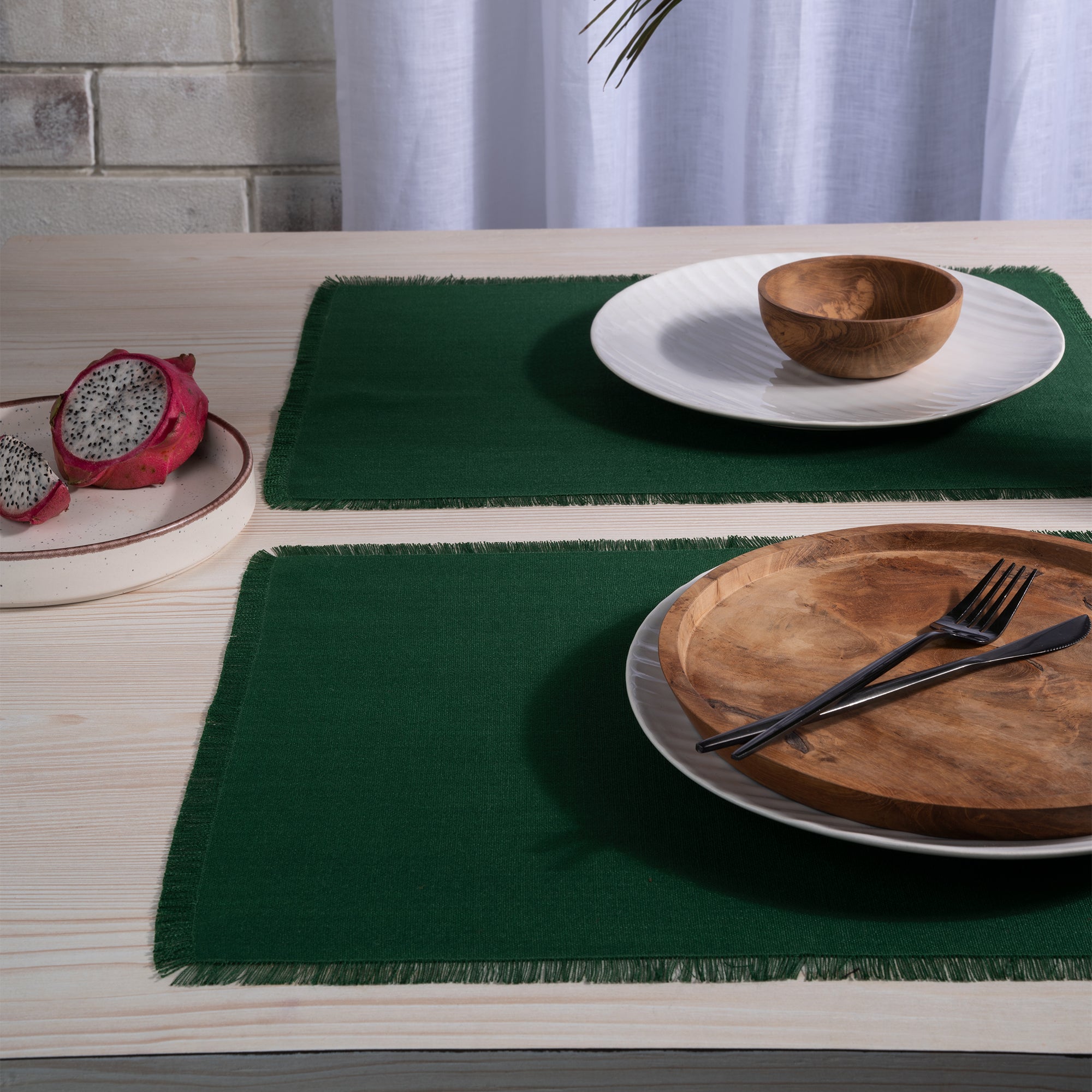 Eden green faux linen placemats with matching D'Moksha table linens