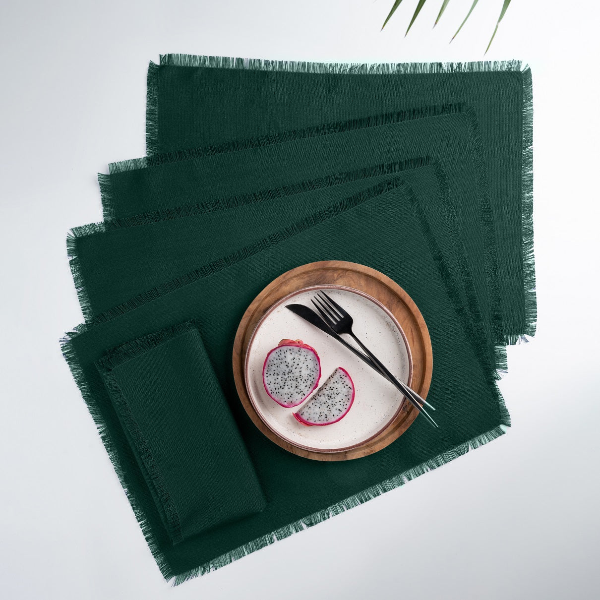 Eden green faux linen placemats with fringed edge, 14 x 19 inches, set of 4
