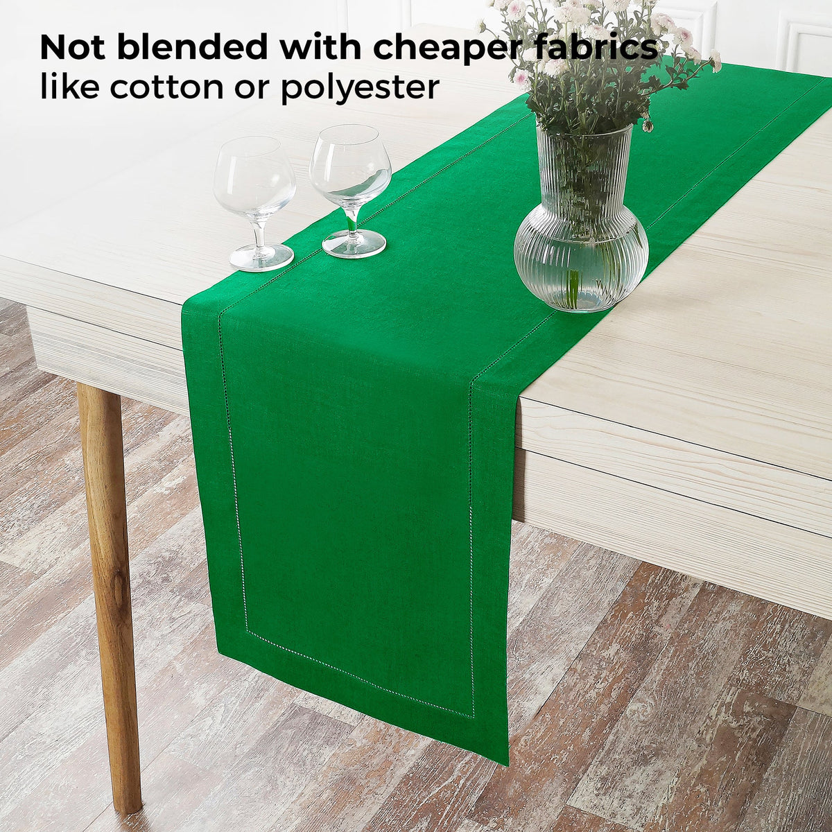 Kelly green linen table runner with matching D'Moksha table linens