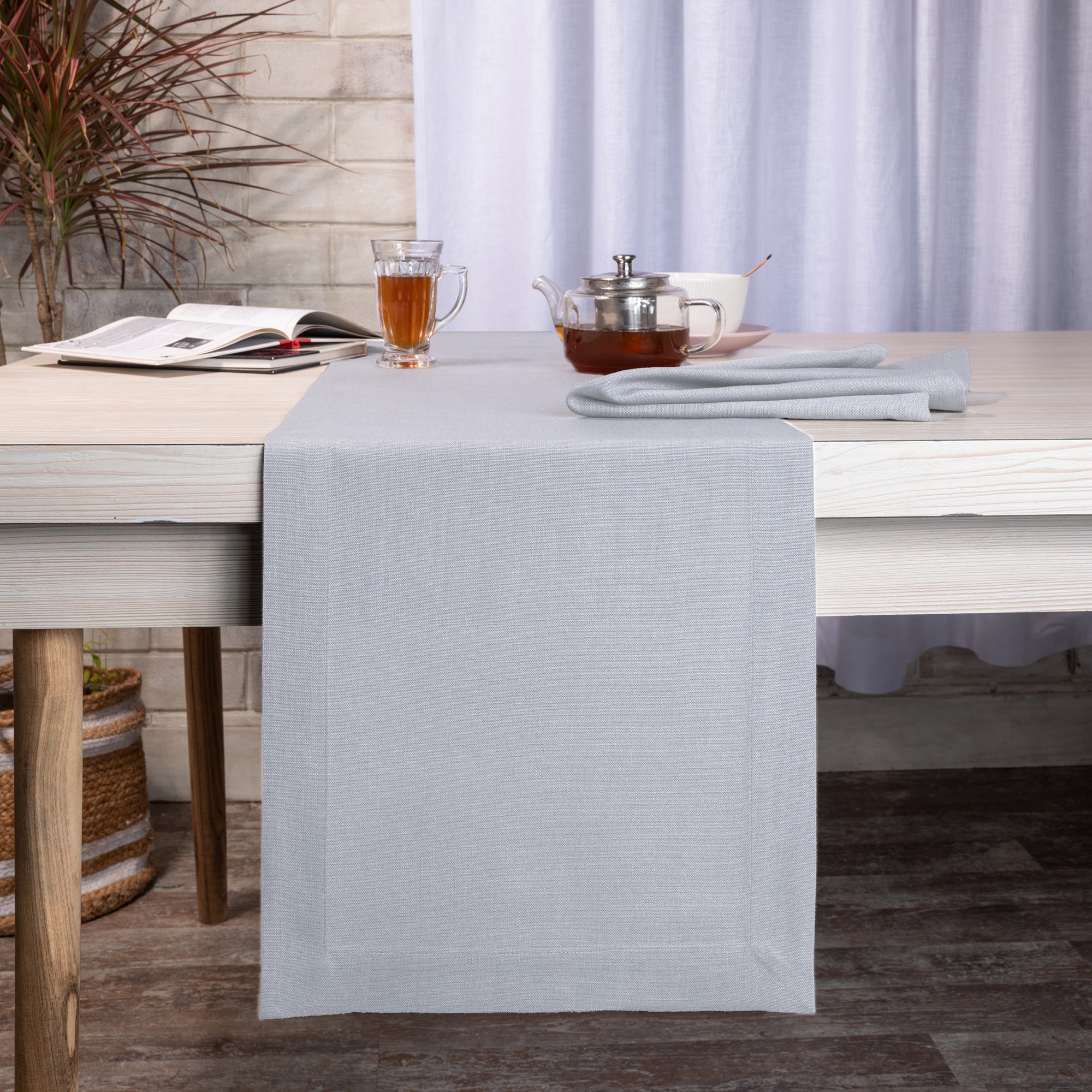 Light grey faux linen table runner with mitered corners, 14 x 36 inches