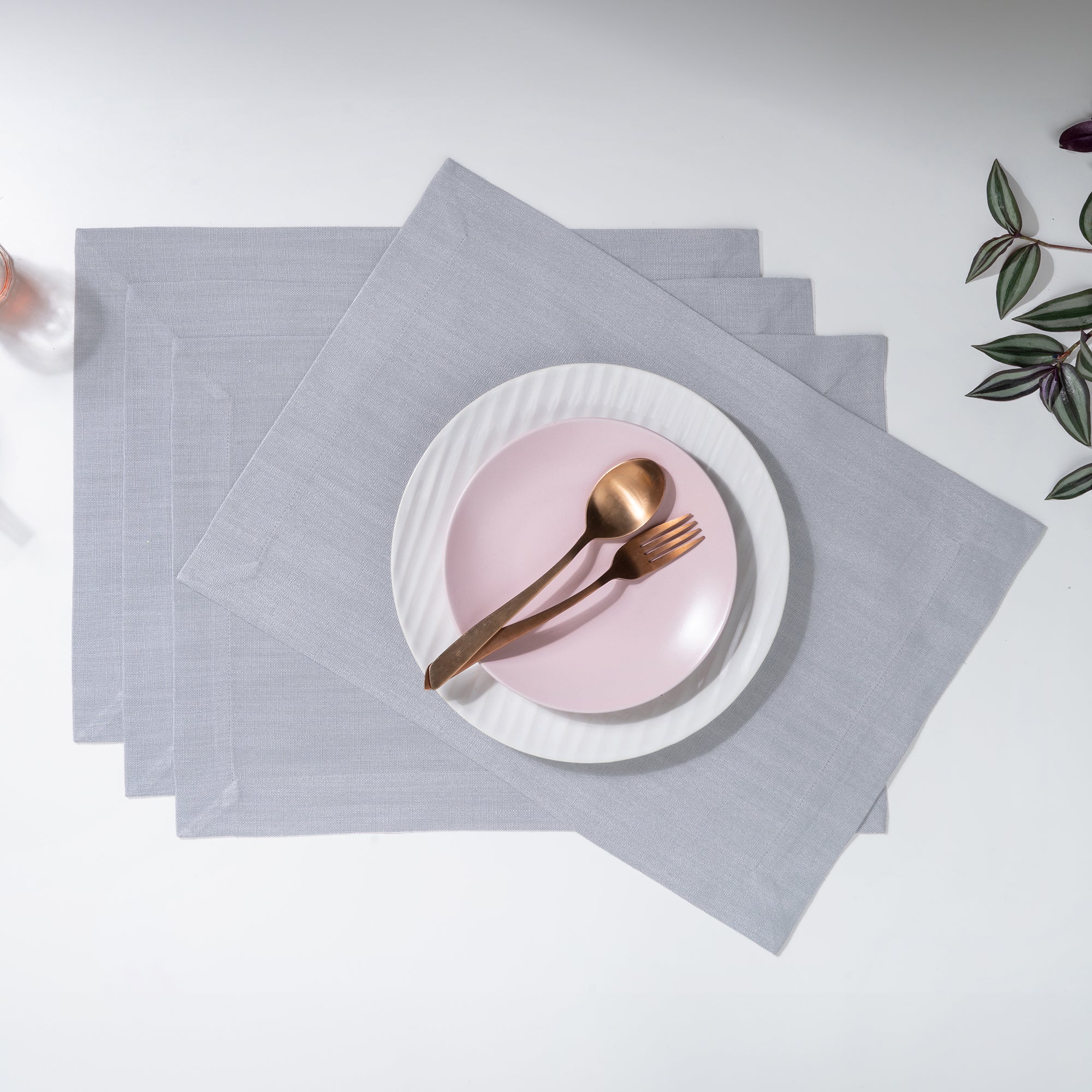 Light grey faux linen placemats with mitered corners, 14 x 19 inches, set of 4