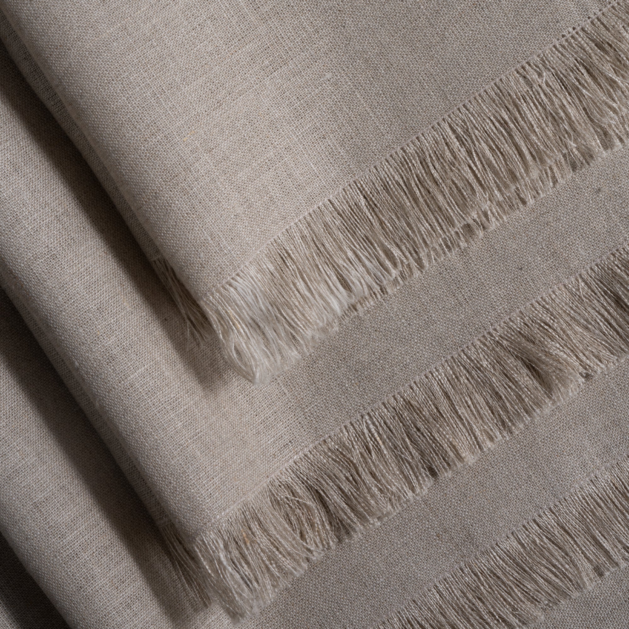 Natural pure linen dinner napkins folded to show fabric texture