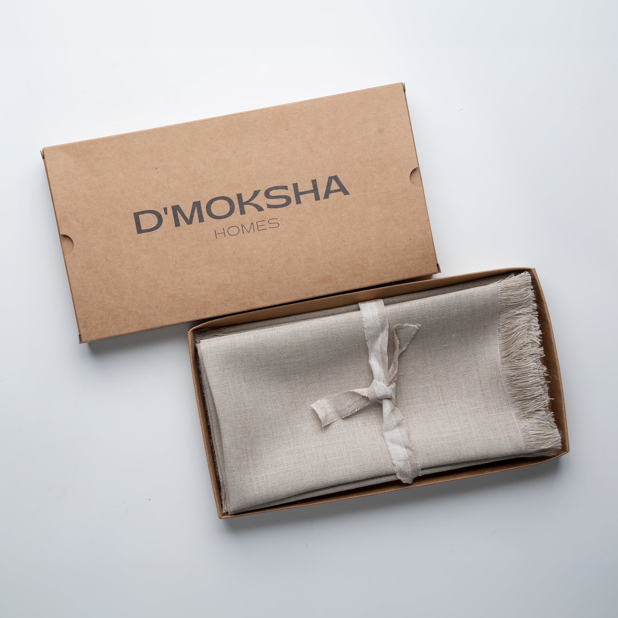Natural pure linen dinner napkins in a set table setting