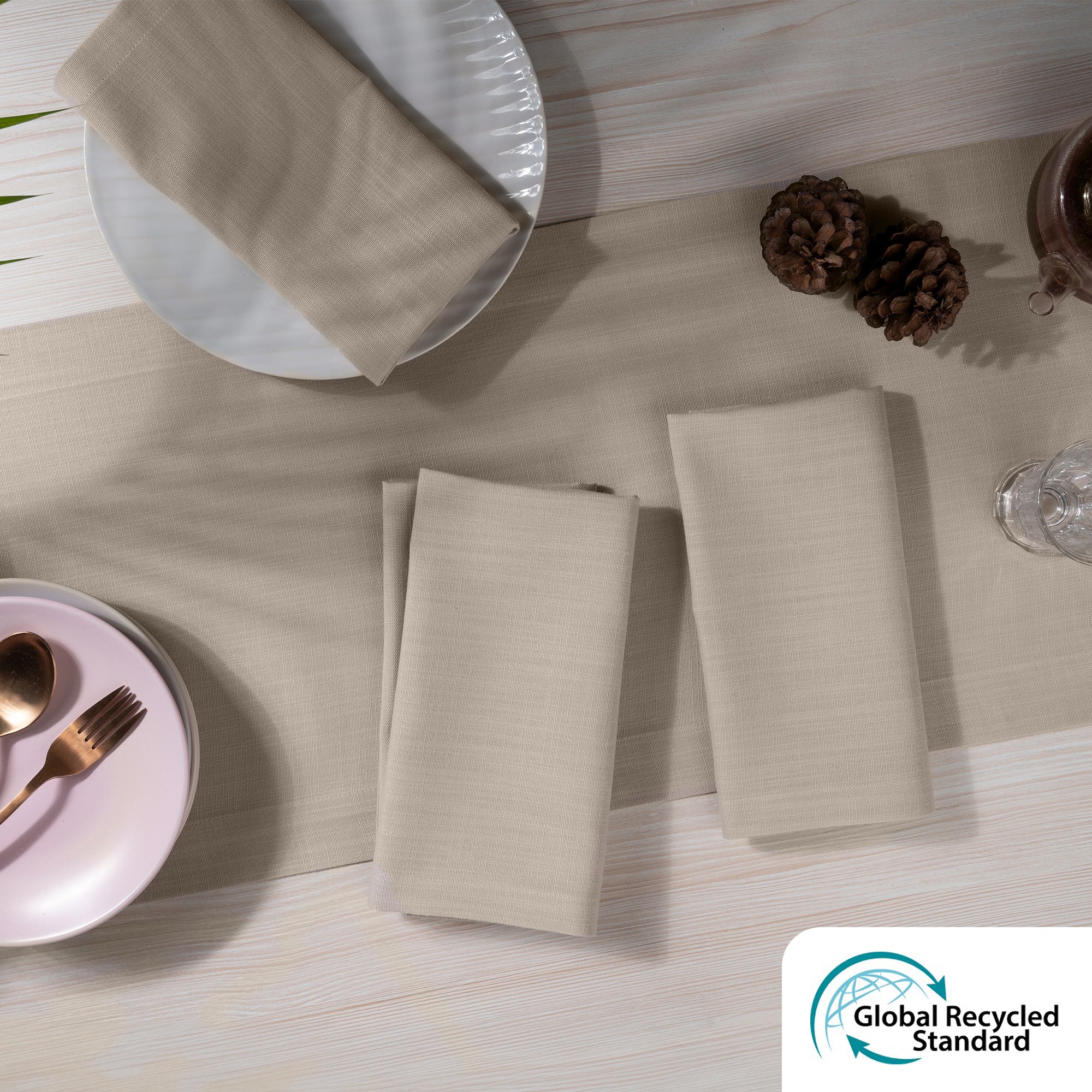 Natural faux linen dinner napkins styled on a dining table