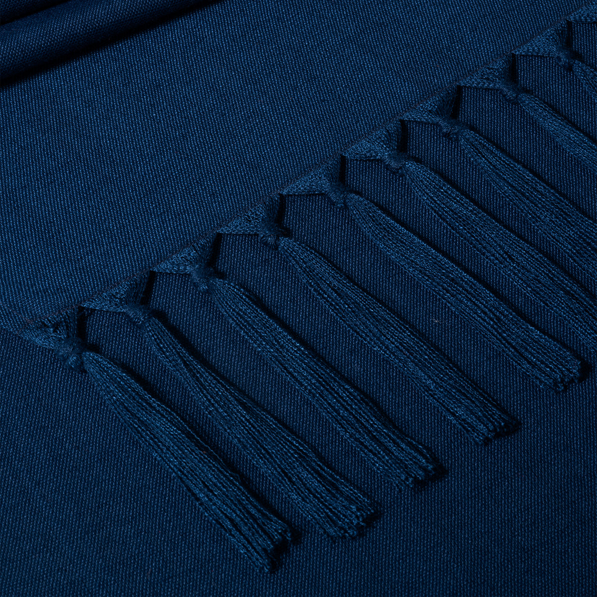 Close-up of the weave on a navy blue faux linen table runner