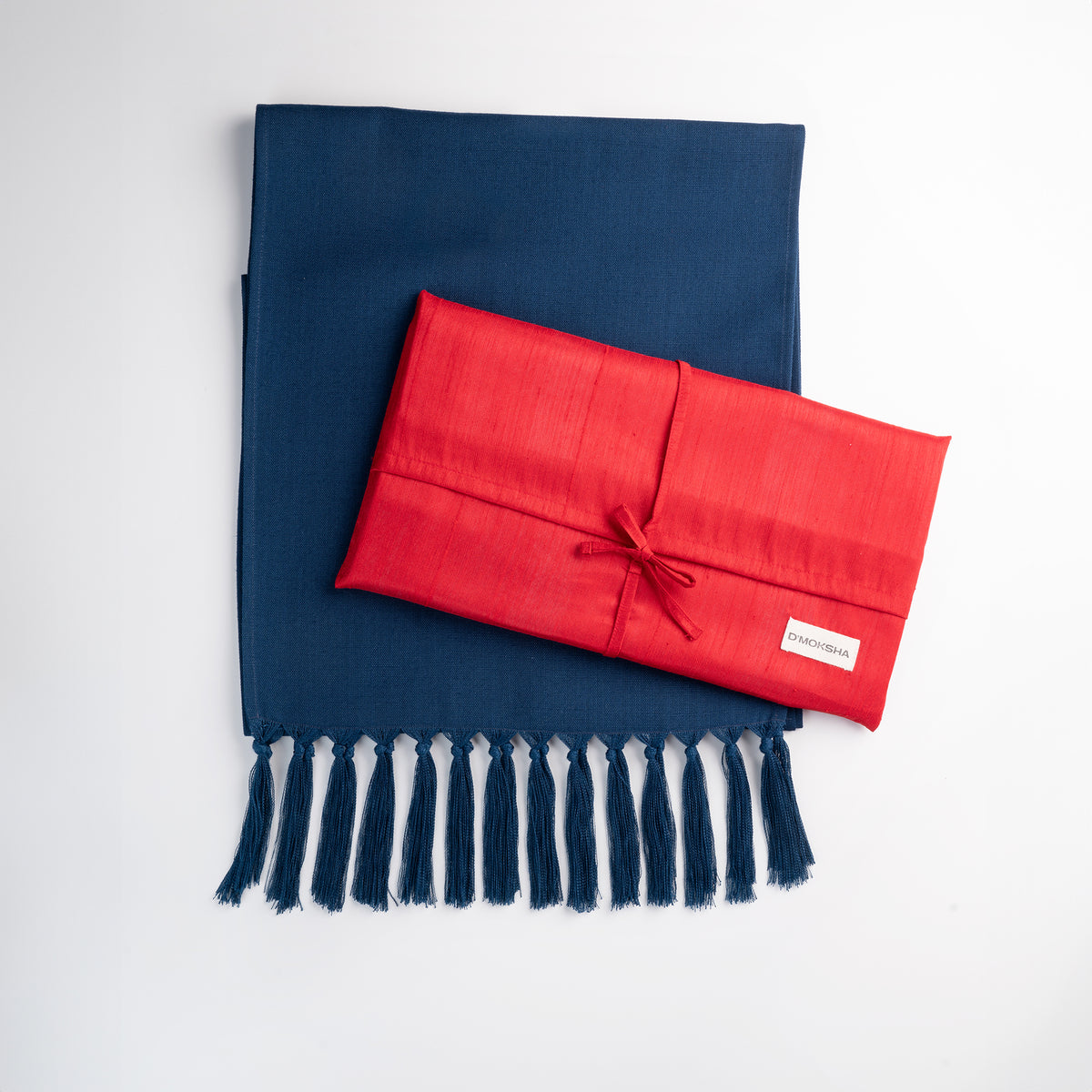Navy blue faux linen table runner folded to show fabric texture