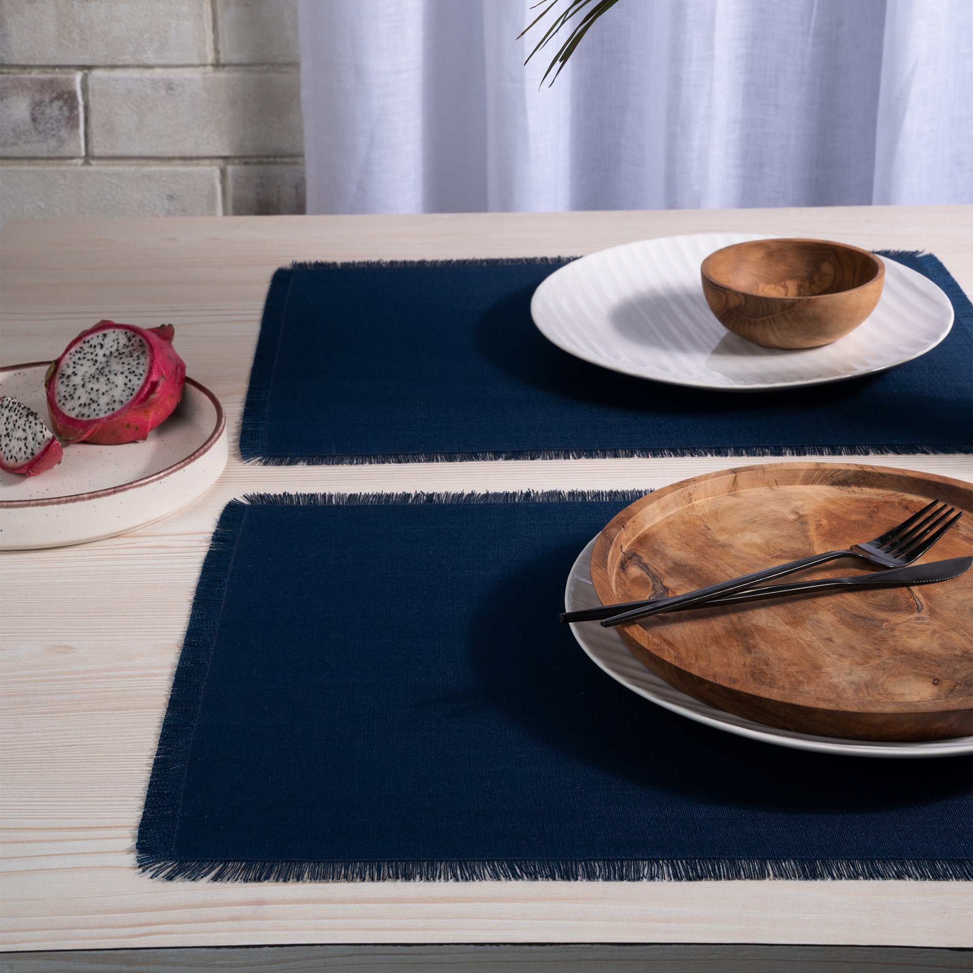 Navy blue faux linen placemats with matching D'Moksha table linens