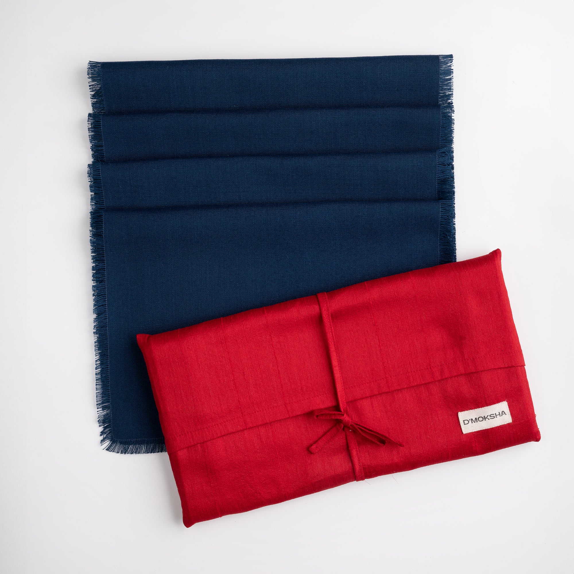 Navy blue faux linen placemats in a set table setting