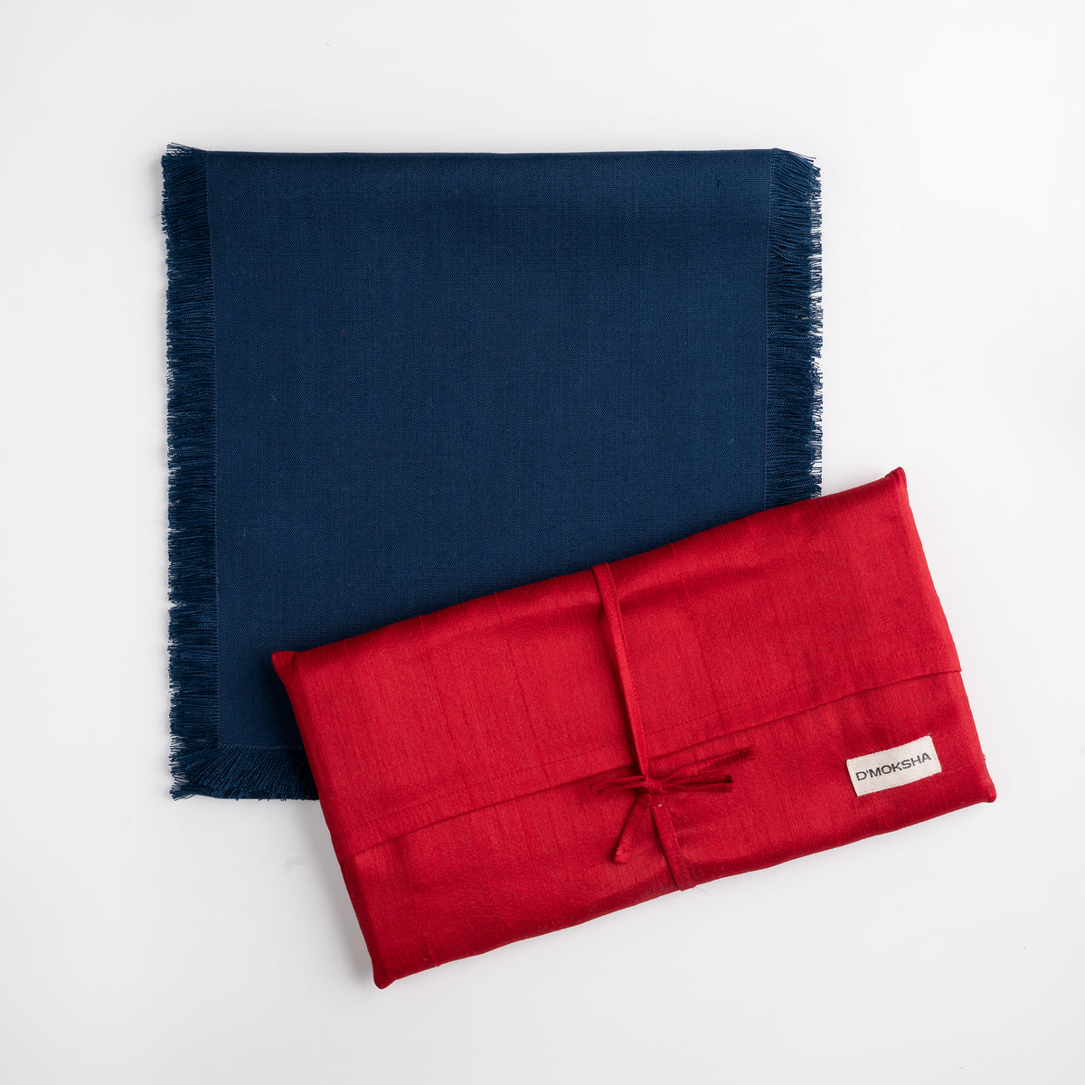 Navy blue faux linen table runner folded to show fabric texture