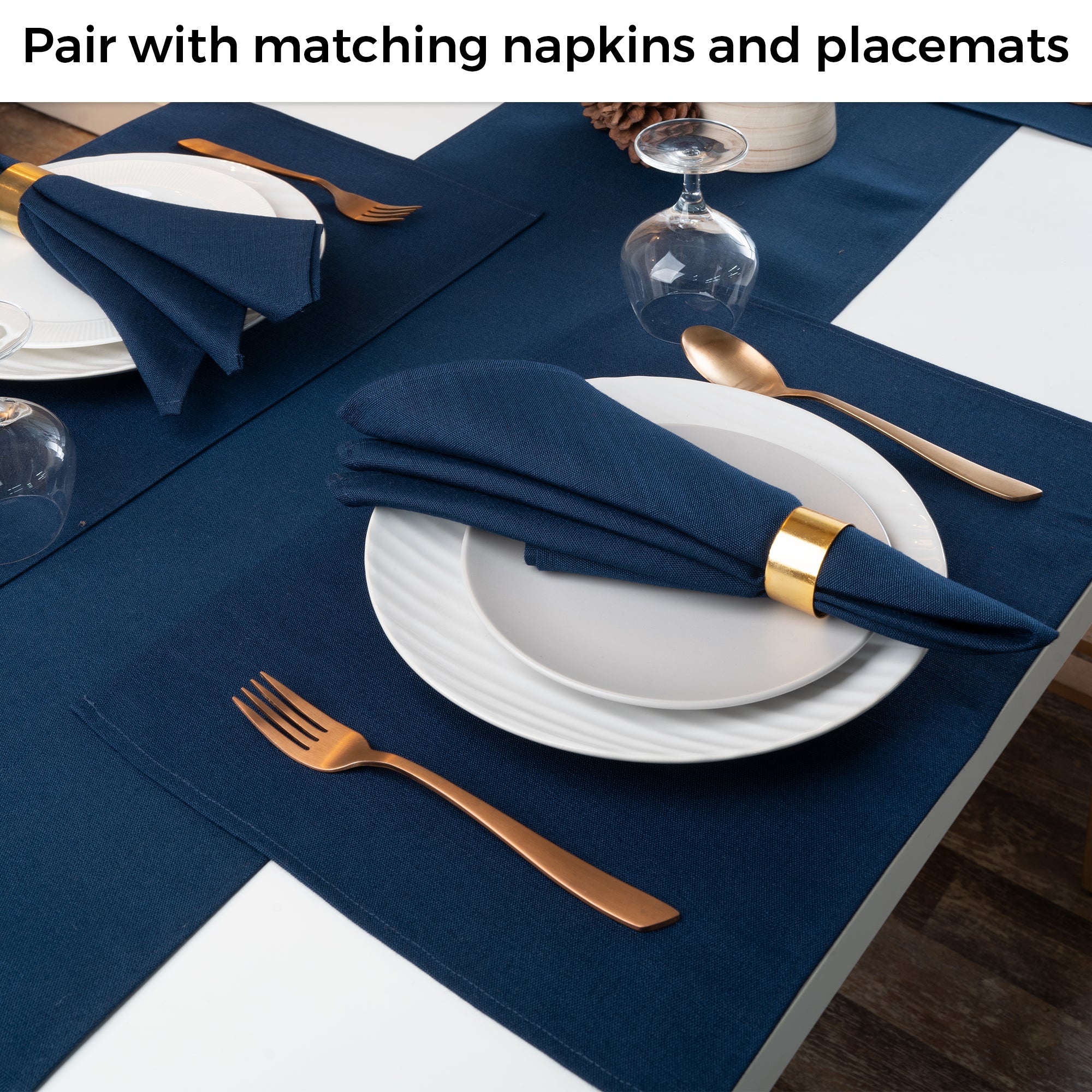 Navy blue faux linen table runner in a set table setting